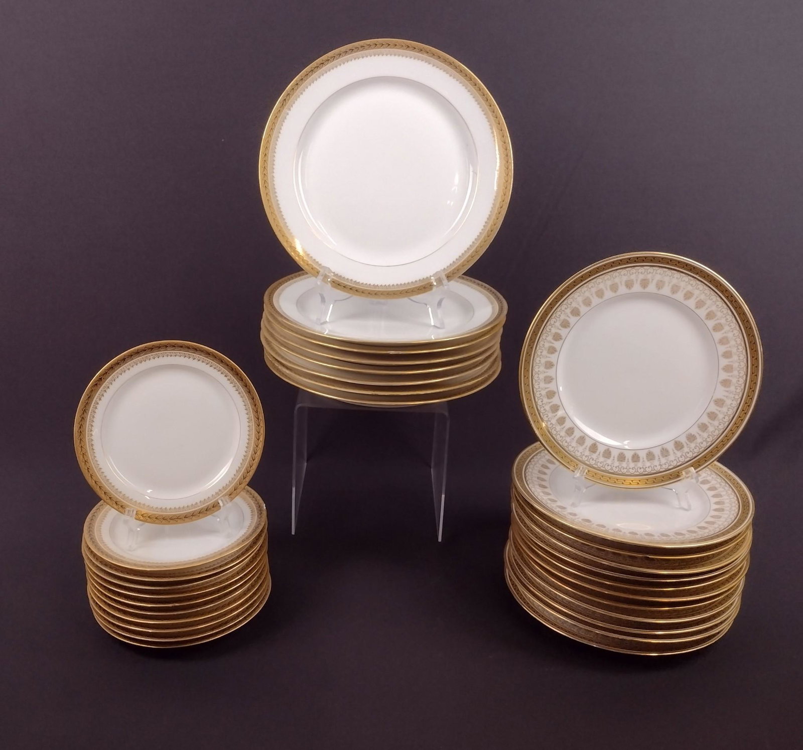 31 Limoges Plates: 6-1/4" to 9-3/4" diameter. MEG Provenance: From the estate of Mary Trost who last resided in the multi generational family home located in Clarks Valley, Dauphin (Harrisburg) Pennsylvania. Mrs. Trost 