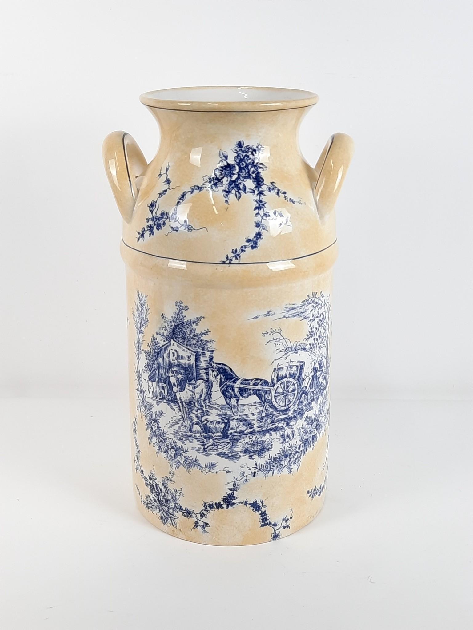Maxcera Porcelain Milk Can: 10-1/2" diameter x 19" high. LR Provenance: From the estate of Mary Trost who last resided in the multi generational family home located in Clarks Valley, Dauphin (Harrisburg) Pennsylvania. Mrs. Trost