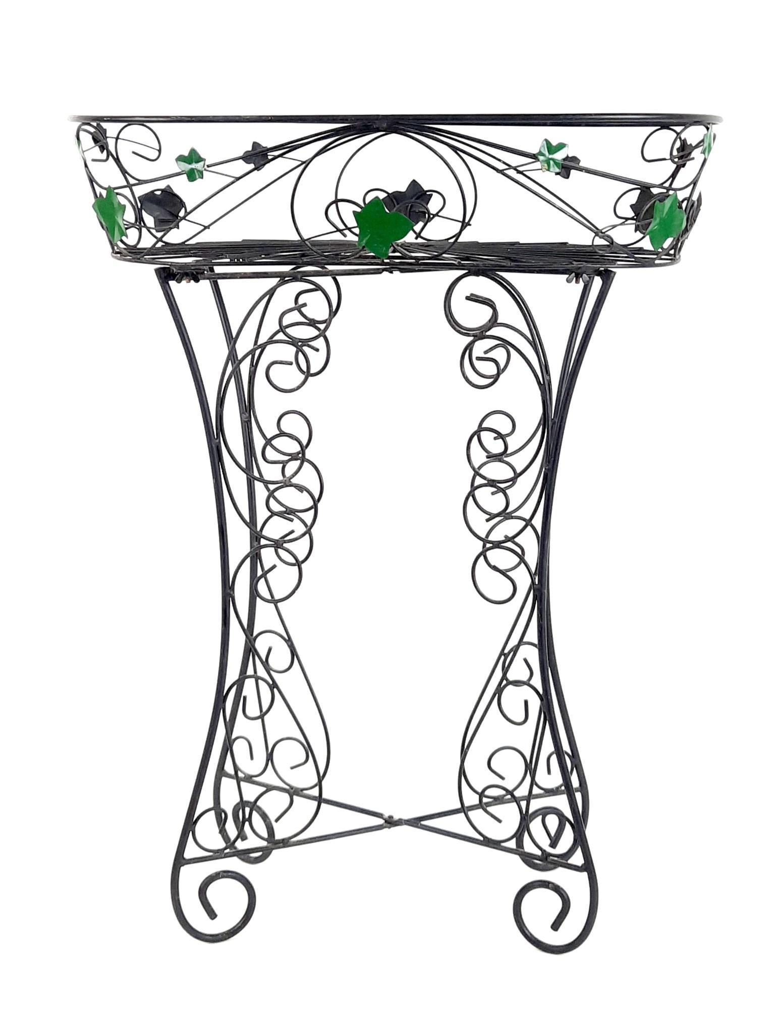 Wire Planter: 21" wide x 11" deep x 27-1/2" high. LR Provenance: From the estate of Mary Trost who last resided in the multi generational family home located in Clarks Valley, Dauphin (Harrisburg) Pennsylvania. Mrs