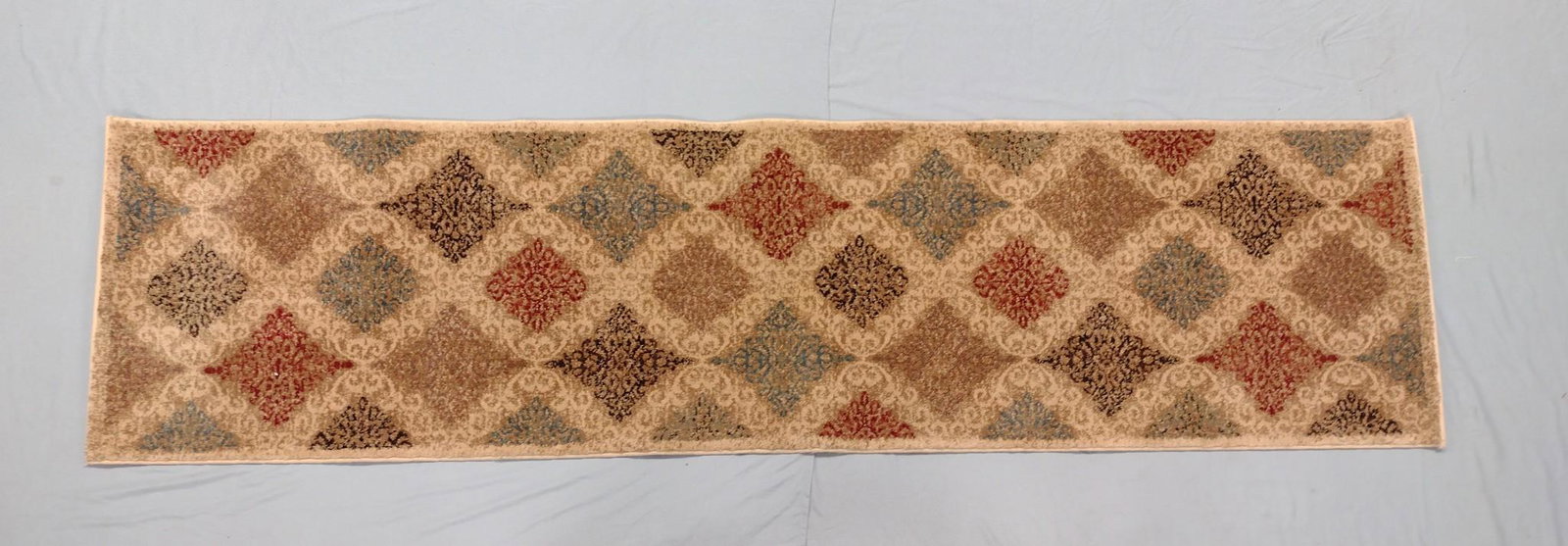Celestial Runner: Machine made. 1'11-1/2" wide x 6'9" long. LR IMPORTANT: Before bidding, please read the terms and conditions. When you registered for the auction you agreed to these terms and will be required to comp