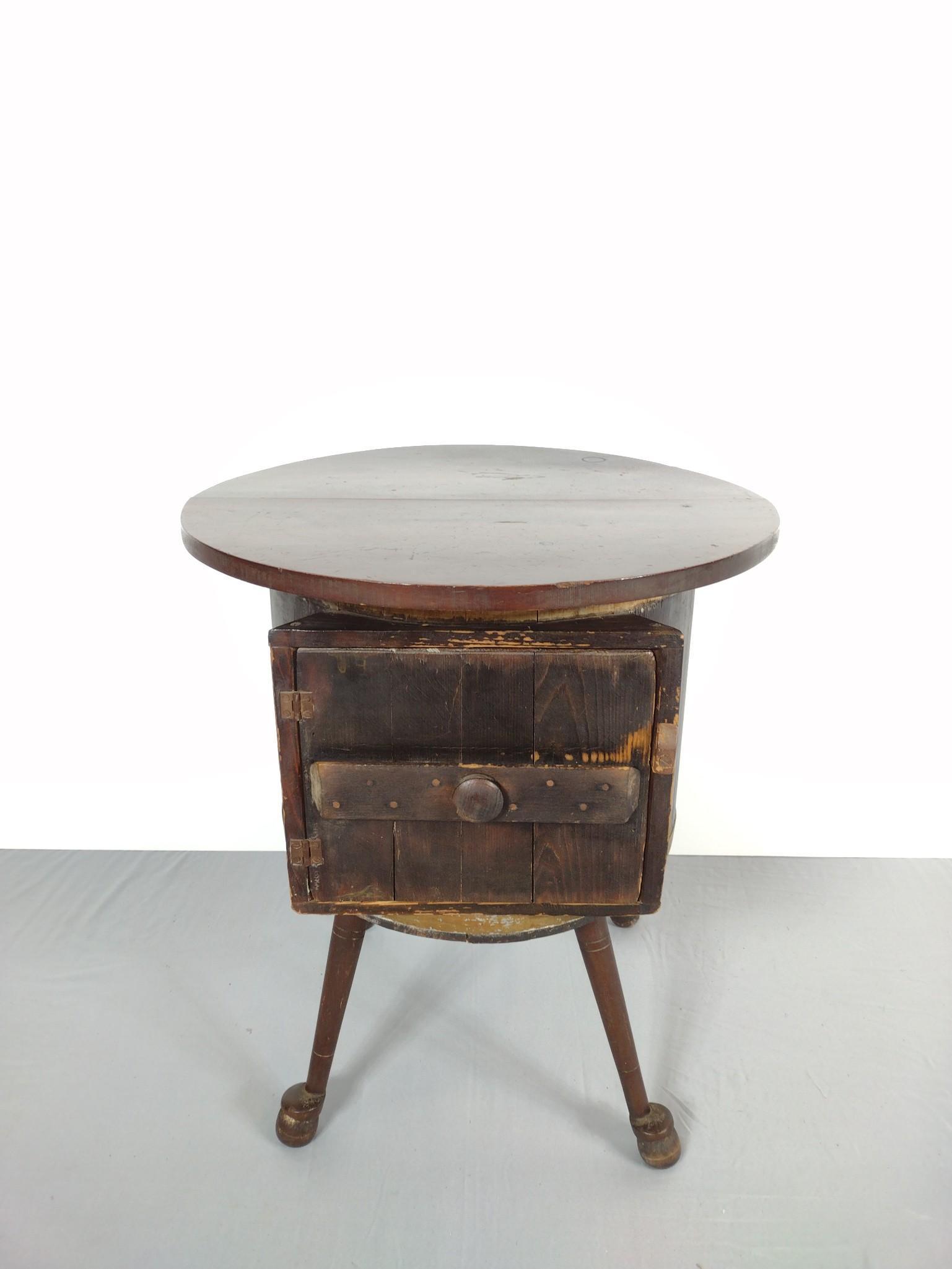 Butter Churn Table: 22-3/4" diameter X 25-1/2" high. Has scratches and finish loss. MG. Provenance: From the estate of Mary Trost who last resided in the multi generational family home located in Clarks Valley, Dauphin (