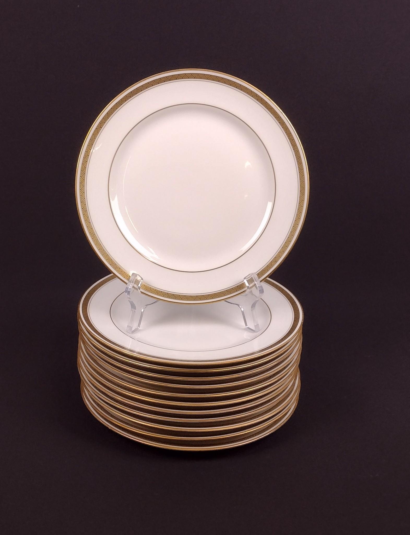 12 C. Ahrenfeldt Limoges Plates: 8-1/4" diameter. MEG Provenance: From the estate of Mary Trost who last resided in the multi generational family home located in Clarks Valley, Dauphin (Harrisburg) Pennsylvania. Mrs. Trost was the da