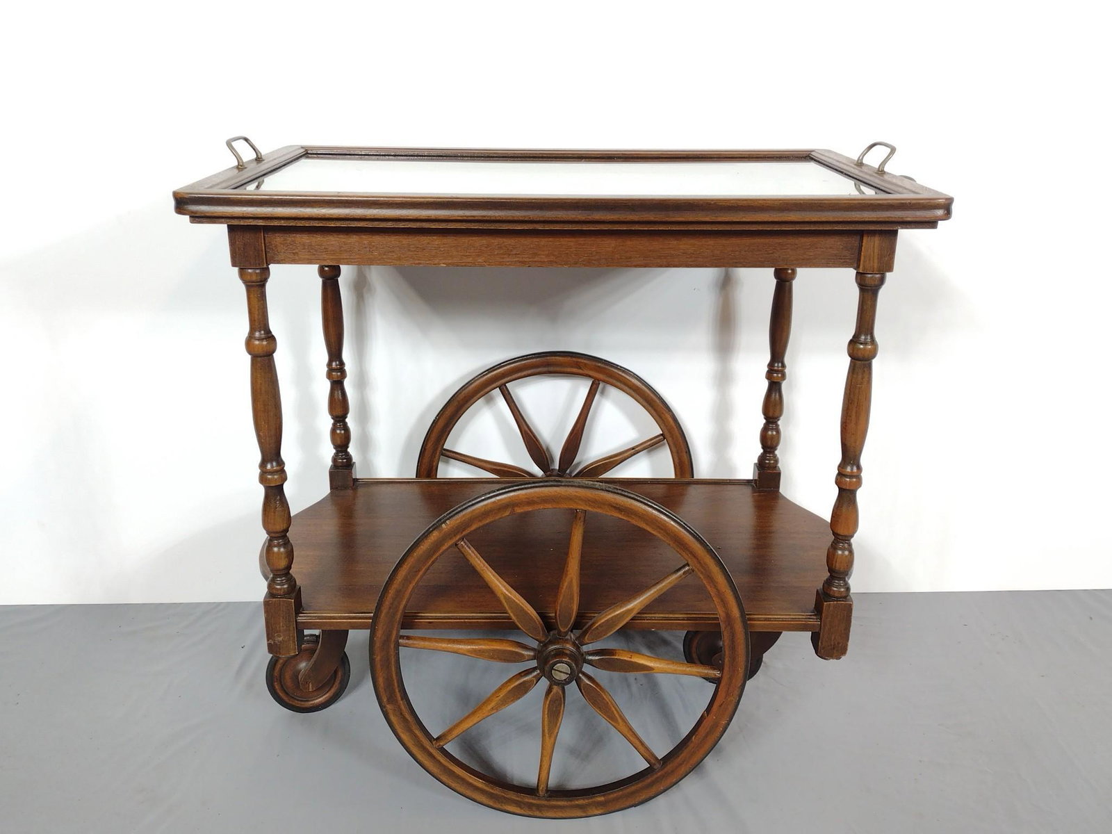 Tea Cart: 18" wide X 30" deep X 28-1/2" high.has some light scratches. MG. IMPORTANT: Before bidding, please read the terms and conditions. When you registered for the auction you agreed to these terms and will