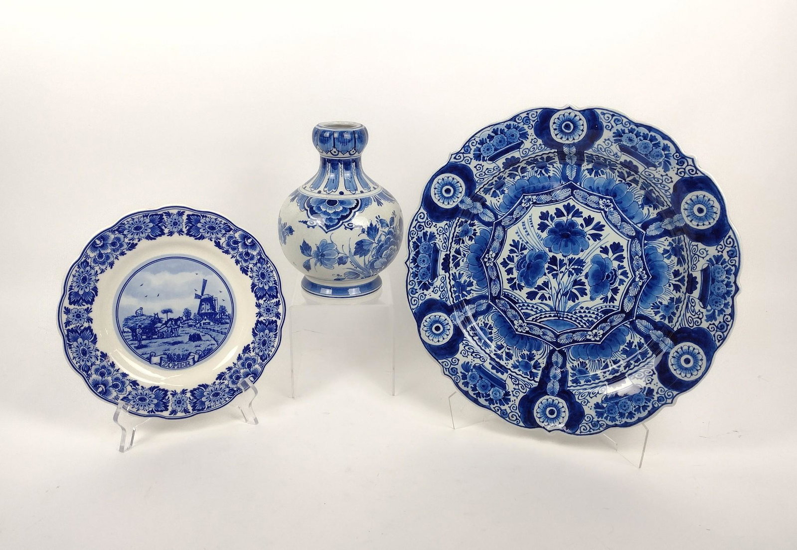 3 Pcs Delft: Plates: 9-3/4" to 14" diameter X 1" to 2" high. MEG Provenance: From the estate of Mary Trost who last resided in the multi generational family home located in Clarks Valley, Dauphin (Harrisburg) Penn