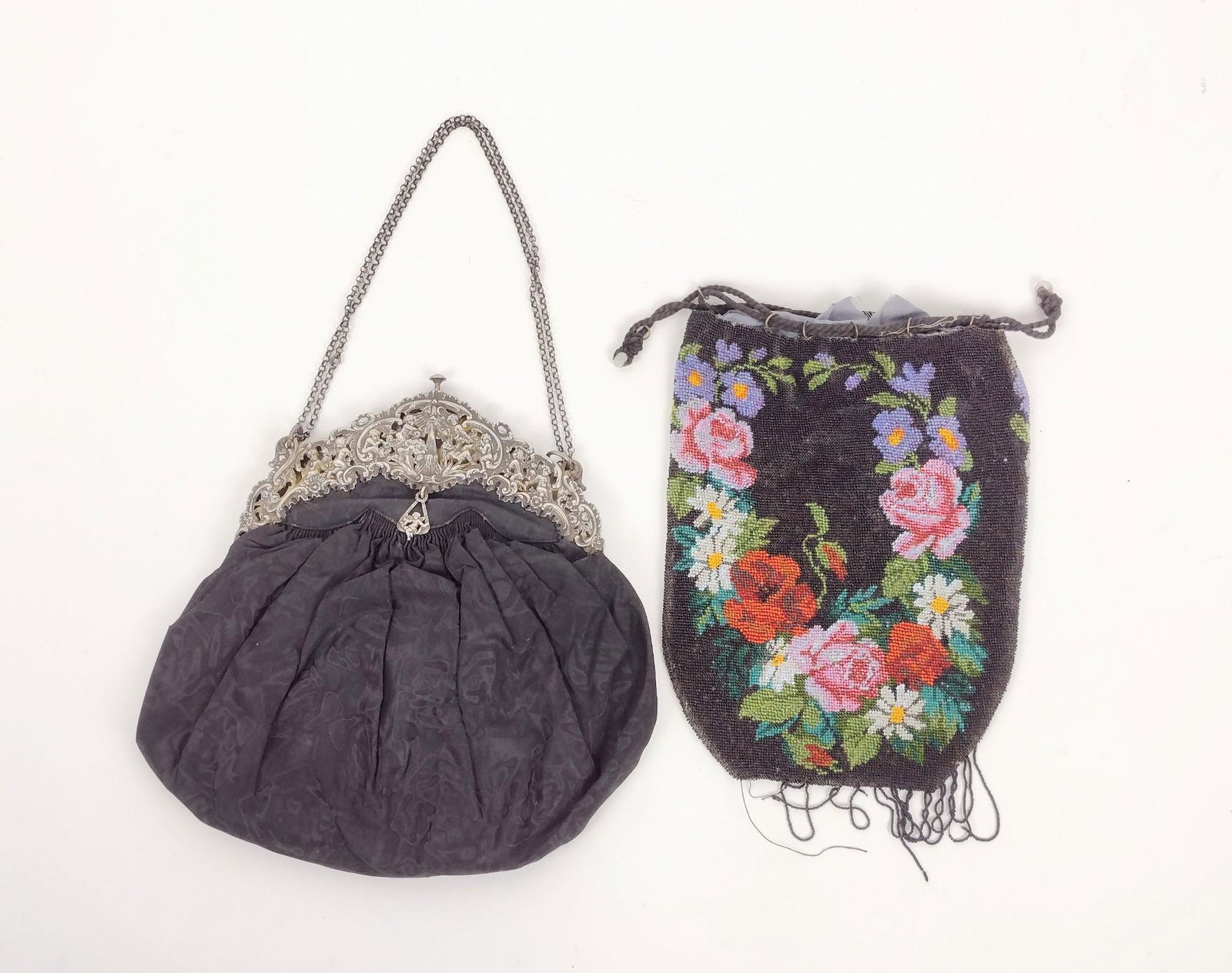 Vintage Beaded Bag & A La Reina des Fees Parisian Bag: Beaded bag has some beaded loss at bottom and lining is ripping. A la Reina des Fees bag lining is fraying. 7-1/4" to 9-3/4" wide X 10-1/4" to 10-1/2" long. MEG Provenance: From the estate of Mary Tro