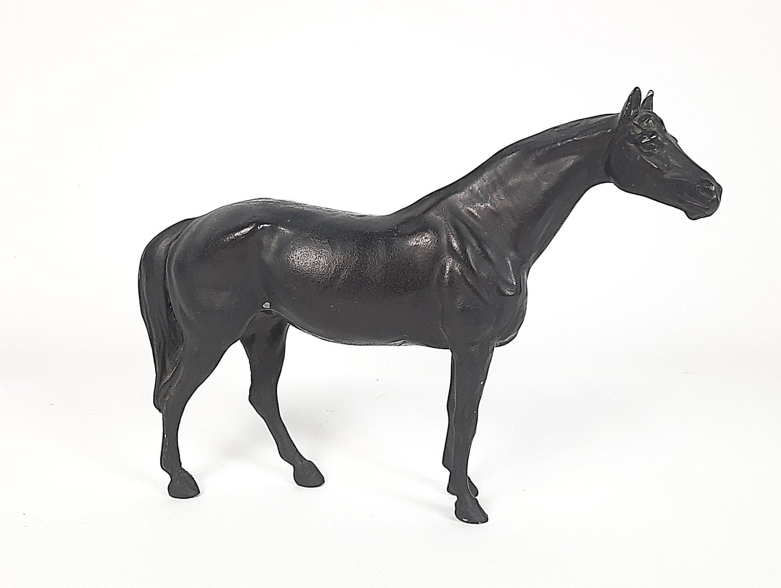 Horse Figurine with Bronzed Finish: 10-1/2" long x 8-1/4" wide. Some finish losses. LR Provenance: From the estate of Mary Trost who last resided in the multi generational family home located in Clarks Valley, Dauphin (Harrisburg) Penns