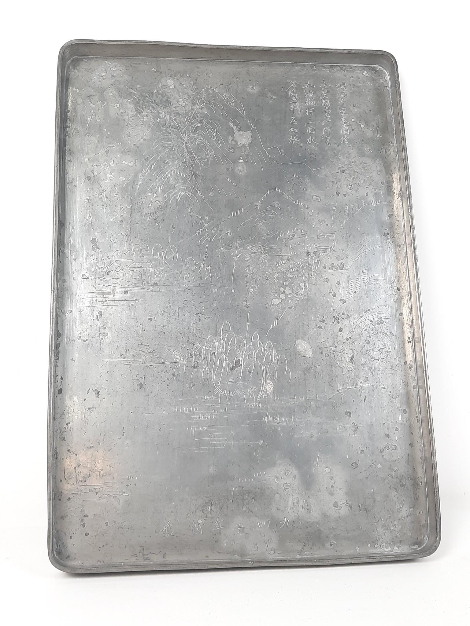 Heavy Chinese Engraved Pewter Tray: 12" wide x 17-1/4" long x 1" high. Some finish loss and pitting. LR Provenance: From the estate of Mary Trost who last resided in the multi generational family home located in Clarks Valley, Dauphin (
