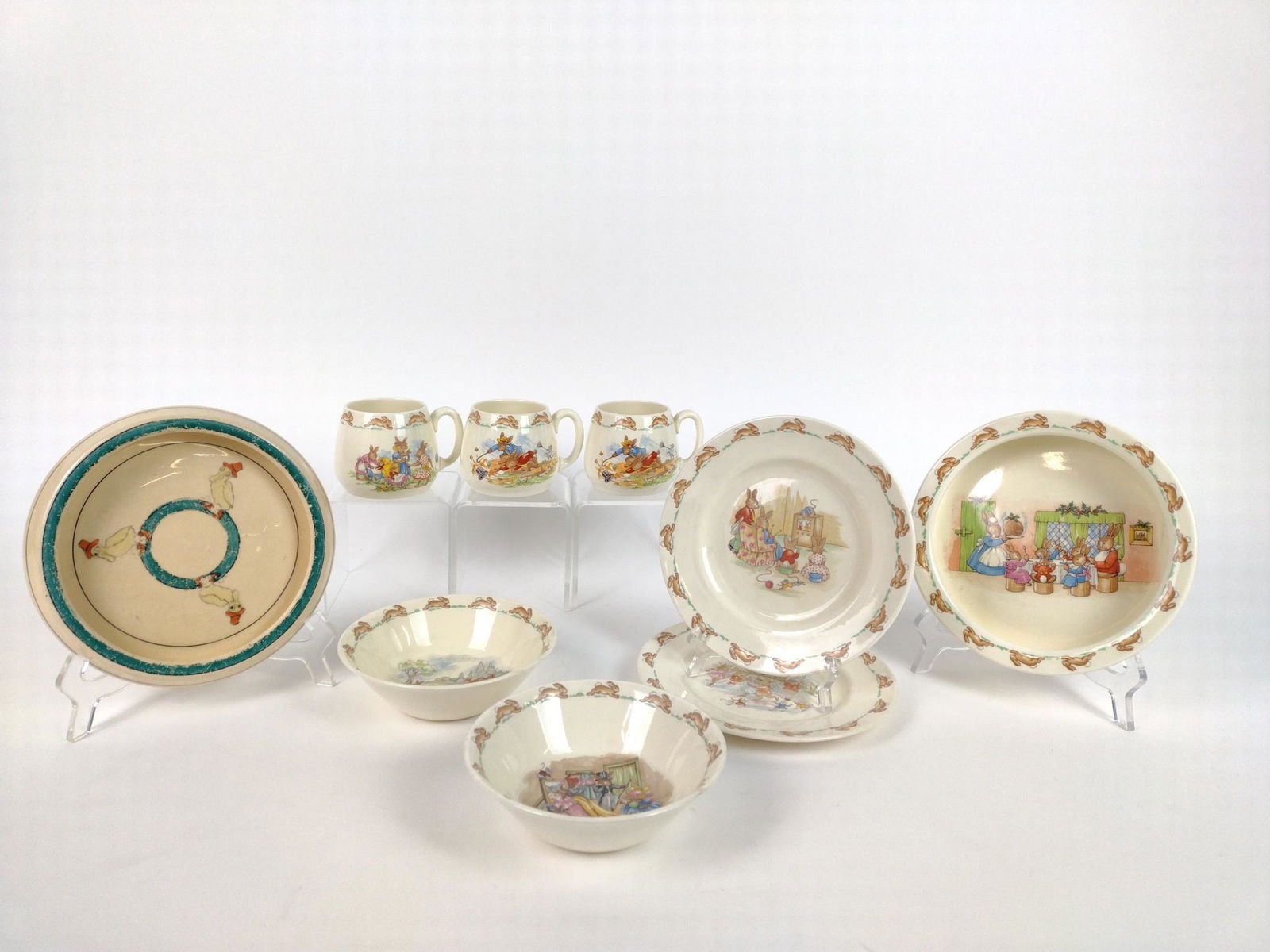 9 Child's Dishes Incl Bunnykins: Includes Royal Dalton and Roseville. 6" to 7-1/2" diameter. Mugs 3" high. 1 bowl and 1 mug with chip. JB IMPORTANT: Before bidding, please read the terms and conditions. When you registered for the au
