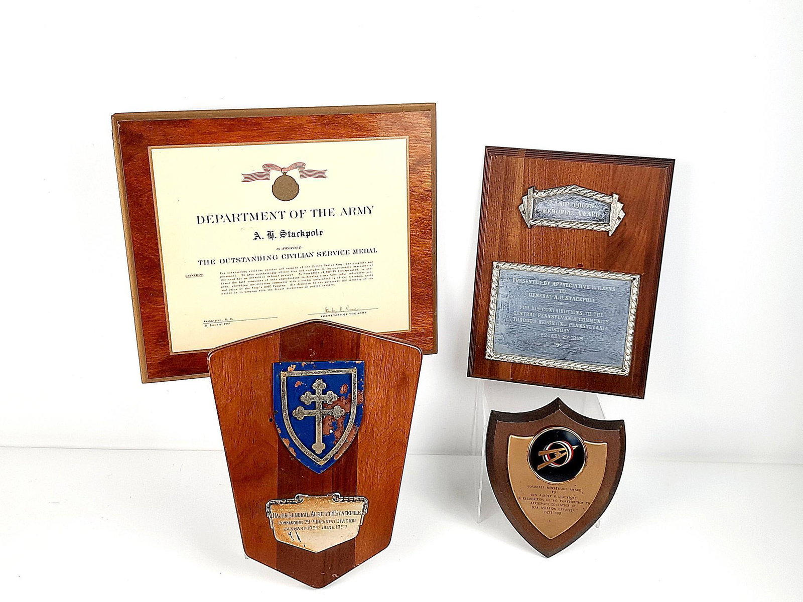 (4) 1957-1968 Plaques Awarded to Albert H. Stackpole: Includes 1967 Outstanding Civilian Service Metal, 1954-1957 Major General of the Commanding 79th Infantry Division, Honorary Membership Award, and February 27, 1968 Sandy Fouts Memorial Award for cont