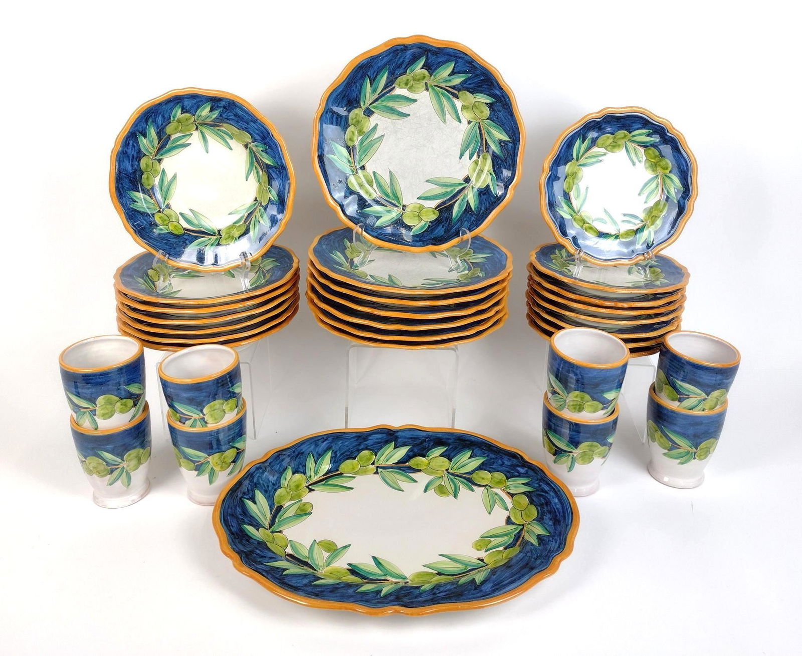 31 Pc Ceramiche d'arte Ravello Dinnerware: Dinner plate: 11" diameter. Serving plate has chip on back edge. Crack in one plate. MEG IMPORTANT: Before bidding, please read the terms and conditions. When you registered for the auction you agreed