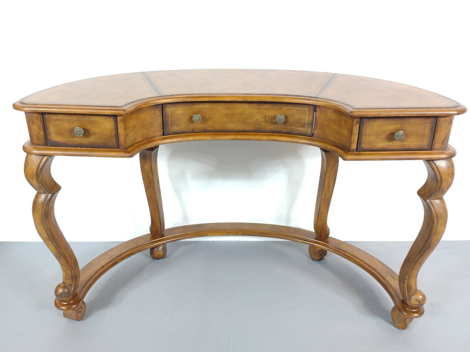 Three Drawer Demilune Desk: 48" wide X 24" deep X 30-1/2" high. No manufactures name found. MG. IMPORTANT: Before bidding, please read the terms and conditions. When you registered for the auction you agreed to these terms and w