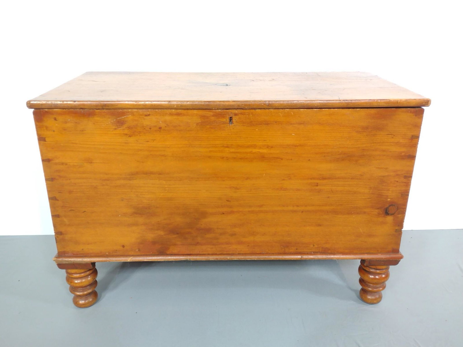 Blanket Chest: 37" wide X 18" deep X 24" high. Has scratches and loss to front bottom corners. MG. IMPORTANT: Before bidding, please read the terms and conditions. When you registered for the auction you agreed to t