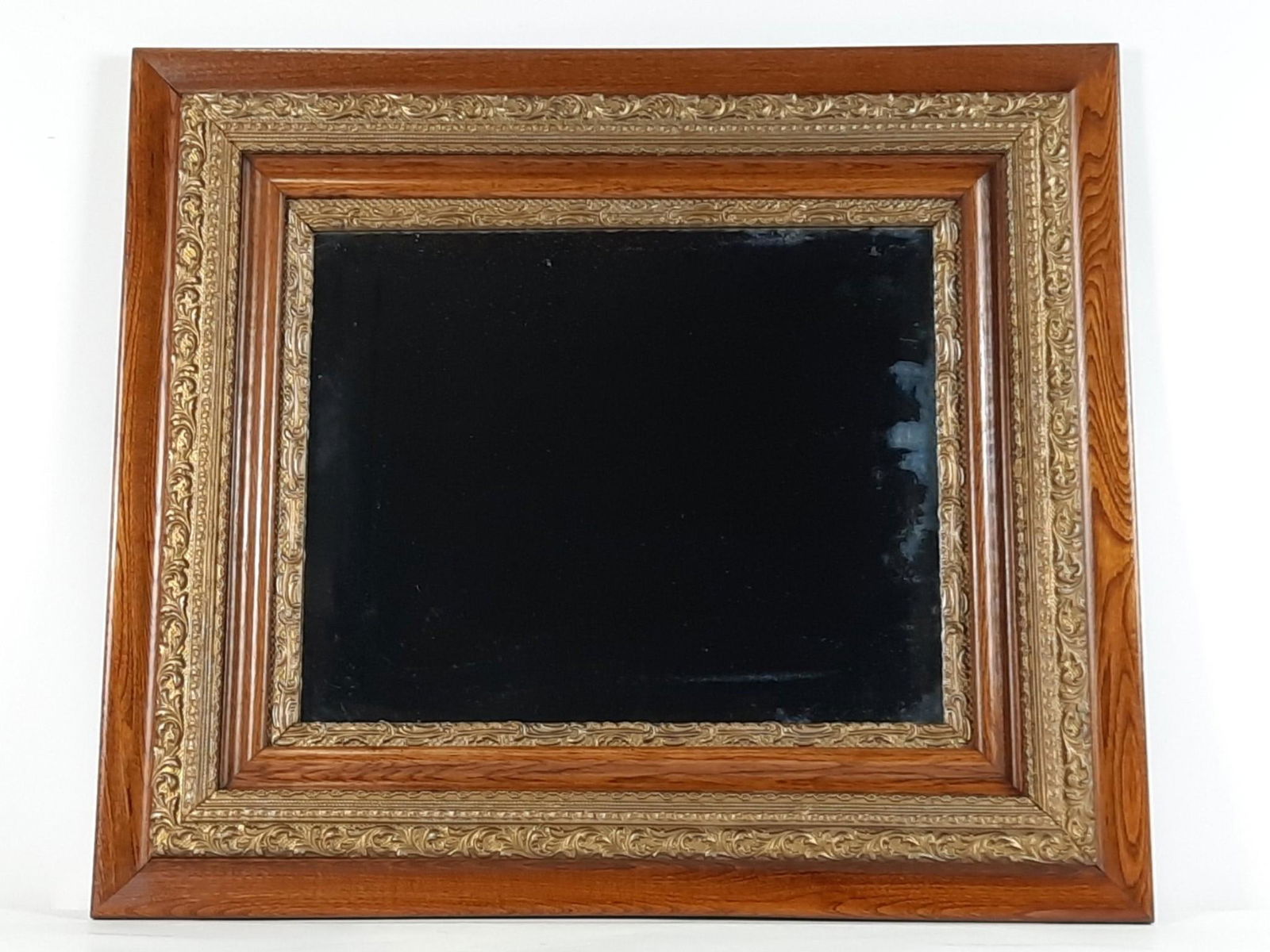 Antique Mirror: Overall with frame 27-1/4" high x 31" wide. Some silvering loss. LR IMPORTANT: Before bidding, please read the terms and conditions. When you registered for the auction you agreed to these terms and w