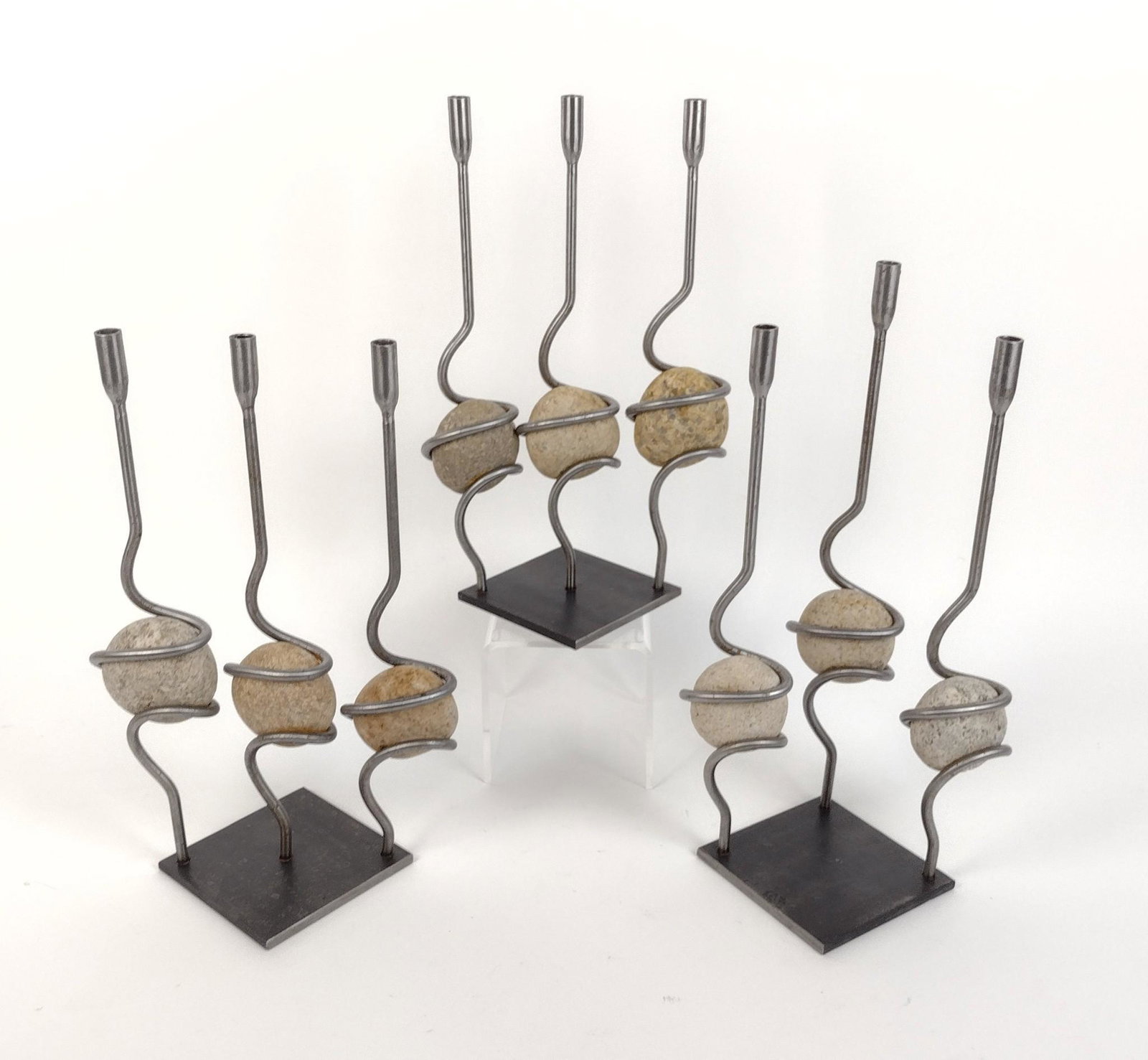 3 Glen Ellen Festa & Company Rock & Iron Candlesticks: 5-1/2" wide X 12" to 13-1/4" high. MEG From the estate of Lois Lehrman Grass Harrisburg, PA. IMPORTANT: Before bidding, please read the terms and conditions. When you registered for the auction you ag
