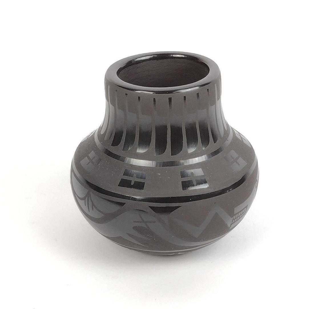 Marvin & Frances Martinez Black on Black Jar: 5-1/2" diameter X 5" high. MEG IMPORTANT: Before bidding, please read the terms and conditions. When you registered for the auction you agreed to these terms and will be required to comply with them.