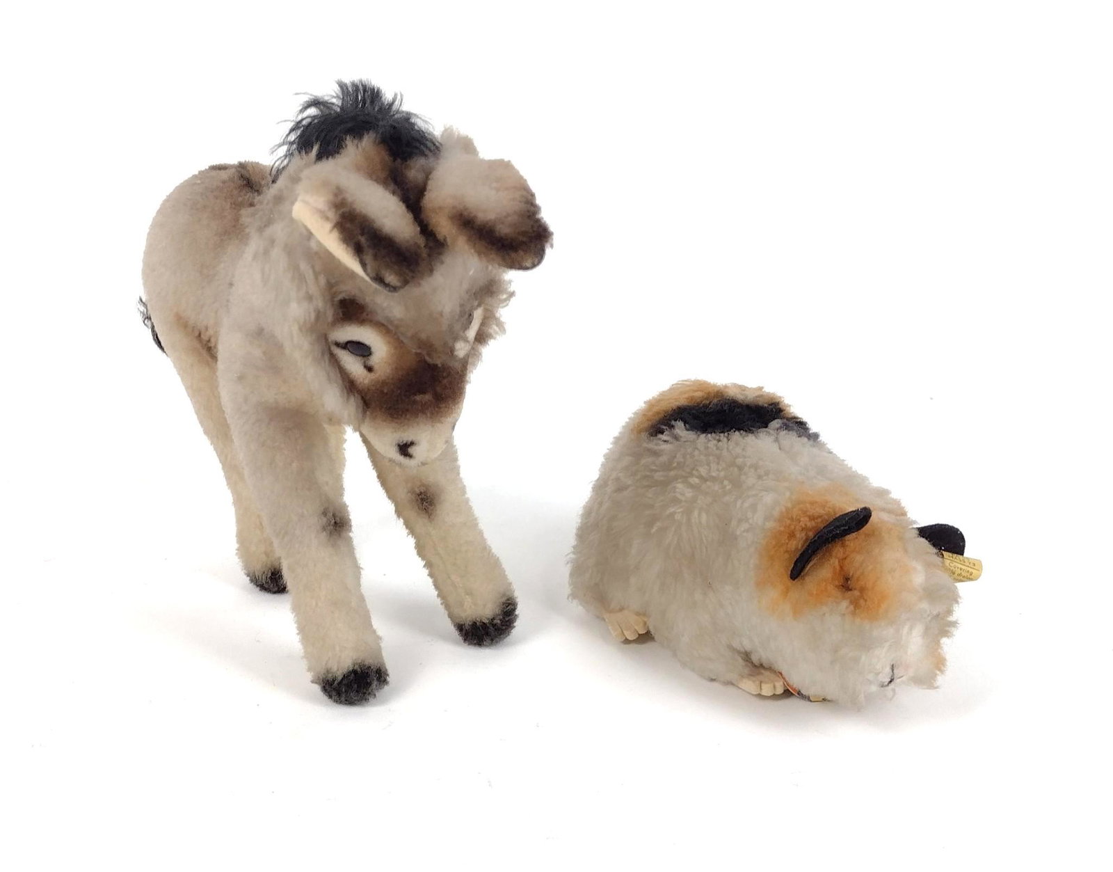 Steiff Grissy & Swinny: 7" to 12-1/2" long X 3-1/2" to 8-1/4" high. Donkey has no ear or paper tag. MEG IMPORTANT: Before bidding, please read the terms and conditions. When you registered for the auction you agreed to these