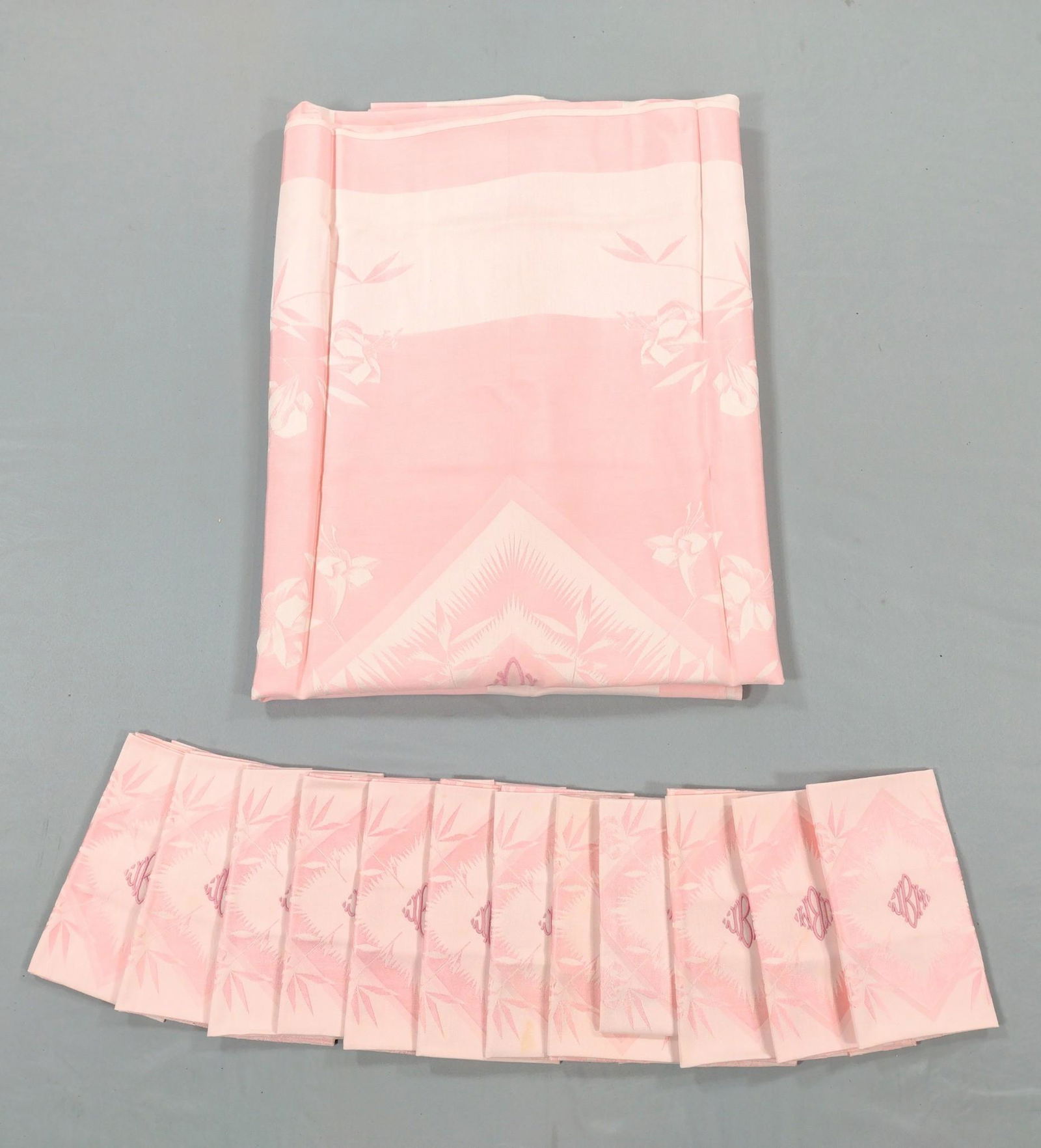 Monogram Table Cover & 12 Napkins: Table cover 9' long X 5' wide. MG. From the estate of Lois Lehrman Grass Harrisbur, PA. IMPORTANT: Before bidding, please read the terms and conditions. When you registered for the auction you agreed