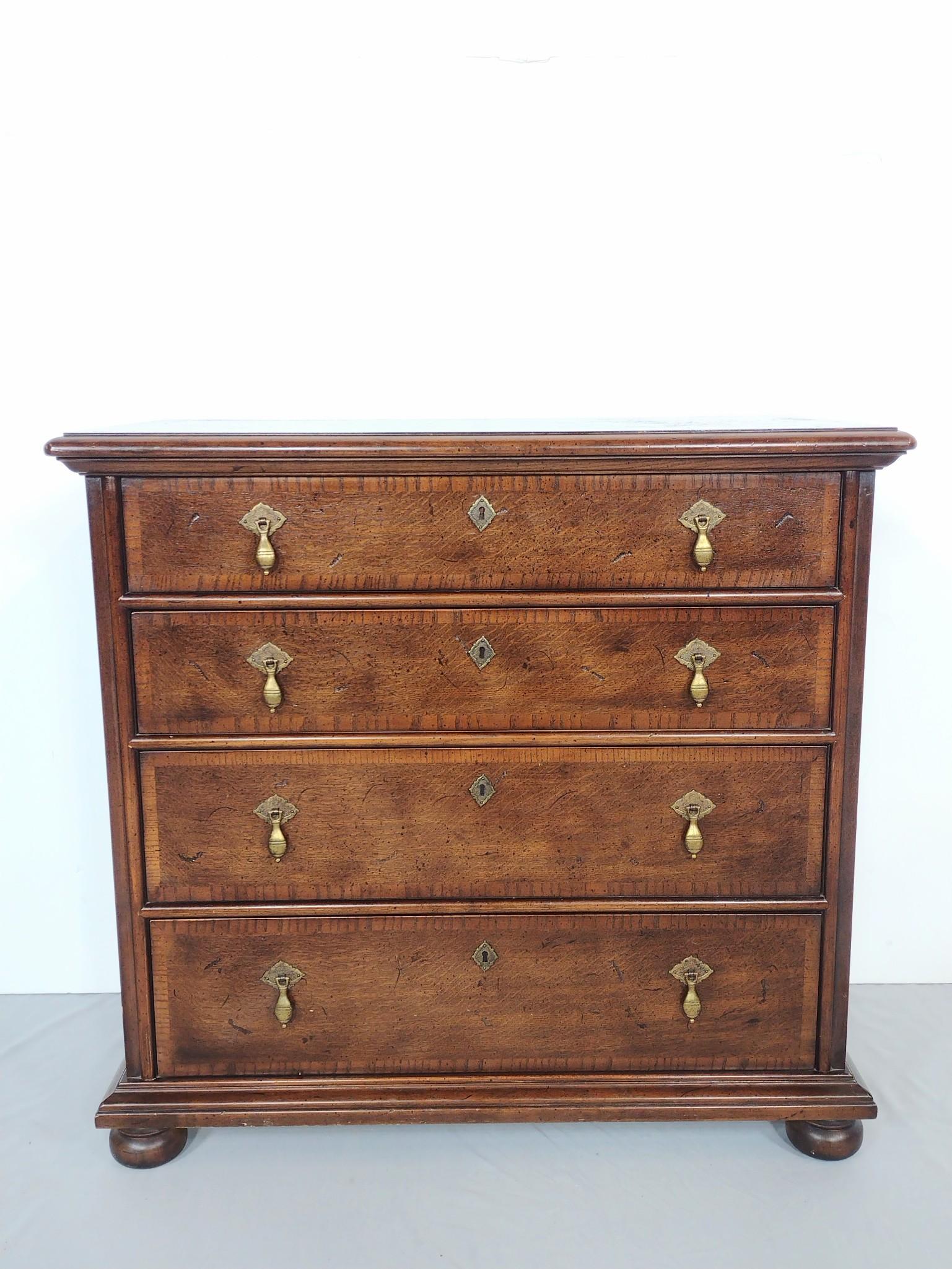 Henredon Four Drawer Chest: 32" wide X 1" deep X 30-1/4" high. MG. IMPORTANT: Before bidding, please read the terms and conditions. When you registered for the auction you agreed to these terms and will be required to comply wit