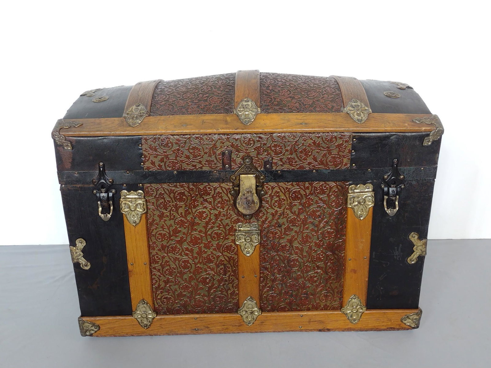Steamer Trunk: 28-1/4" wide X 16" deep X 21" high. Has some scratches and areas of discoloring. MG. IMPORTANT: Before bidding, please read the terms and conditions. When you registered for the auction you agreed to 