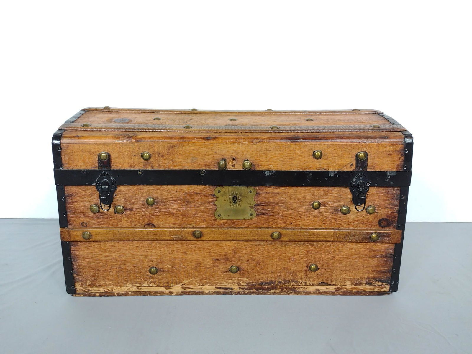 Small Trunk: 28-3/4" wide X 15-1/4" deep X 15" high. Paper liner has been removed. To starting to split. MG. IMPORTANT: Before bidding, please read the terms and conditions. When you registered for the auction you