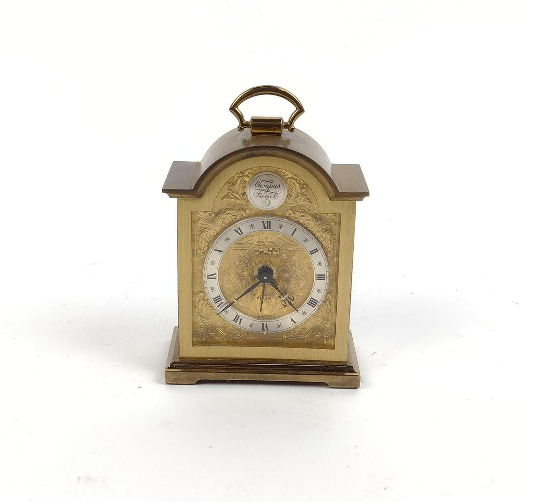 Swiza Sheffield Tempus Fugit (Time Flies) Desk Clock: 2-3/4" wide X 1-1/2" deep X 4" high. MEG IMPORTANT: Before bidding, please read the terms and conditions. When you registered for the auction you agreed to these terms and will be required to comply w