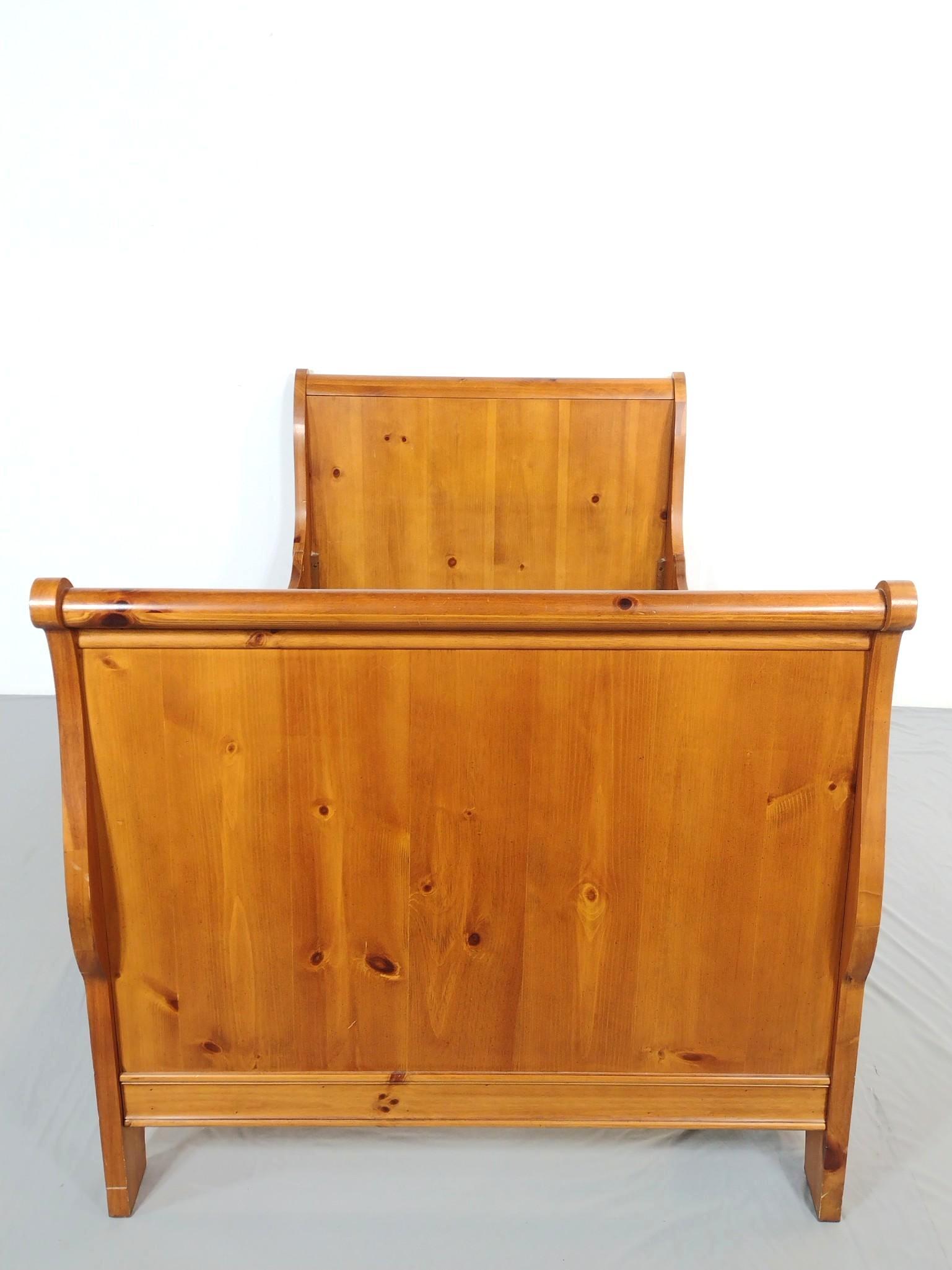 Twin Sleigh Bed: 41-1/2" wide X 80" deep X 38" high. Has some scratches. MG. IMPORTANT: Before bidding, please read the terms and conditions. When you registered for the auction you agreed to these terms and will be r