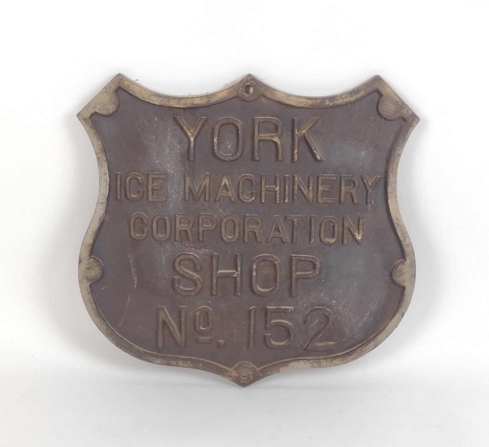 York Ice Machinery Corporation Shield: Cast Iron. 17" wide X 16" high. MEG IMPORTANT: Before bidding, please read the terms and conditions. When you registered for the auction you agreed to these terms and will be required to comply with t