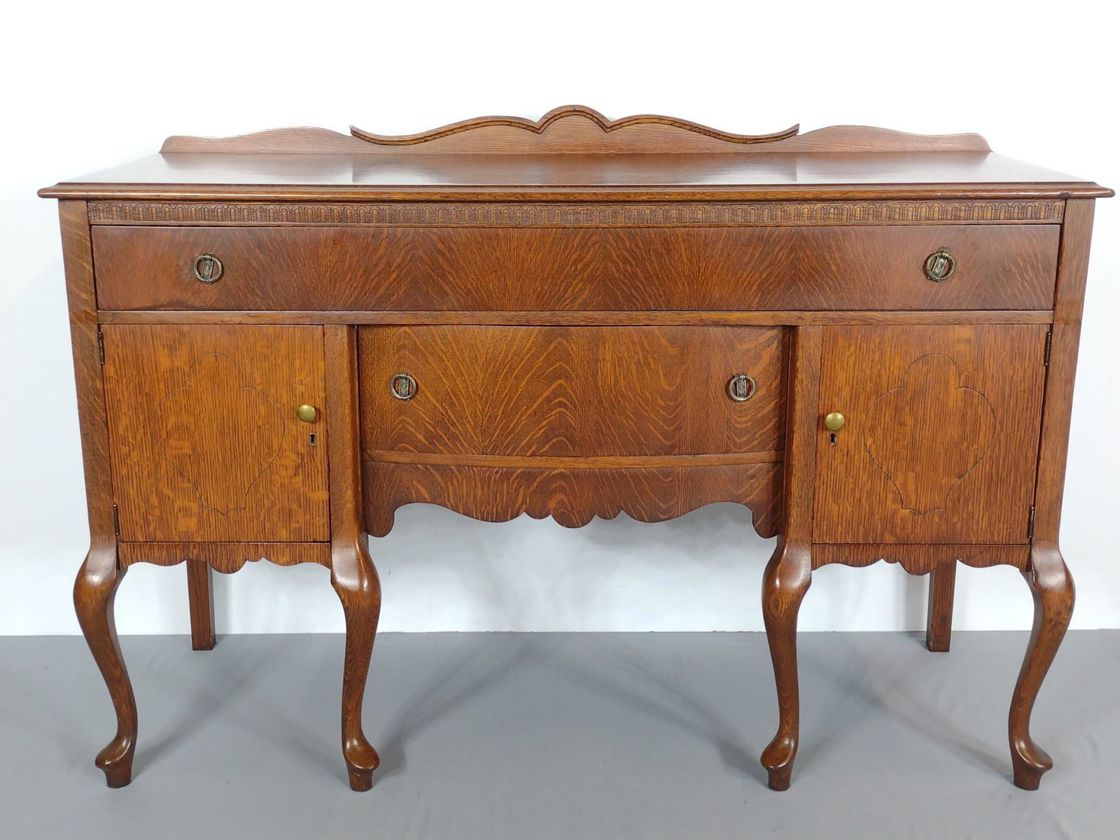 Sideboard: 60" wide X 22" deep X 40-1/2" high. Has a few scratches. No manufactures name found. MG. IMPORTANT: Before bidding, please read the terms and conditions. When you registered for the auction you agreed