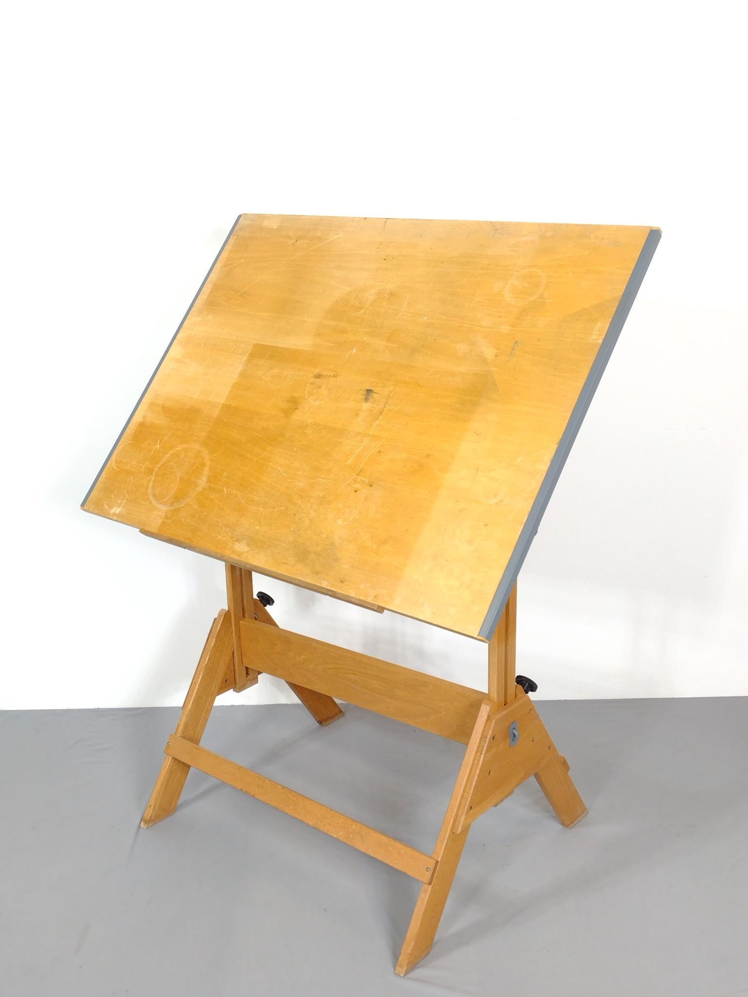 Drafting Table: 42" wide X 26" deep X 53" high. Has some scratches. No manufactures name found. MG. IMPORTANT: Before bidding, please read the terms and conditions. When you registered for the auction you agreed to t