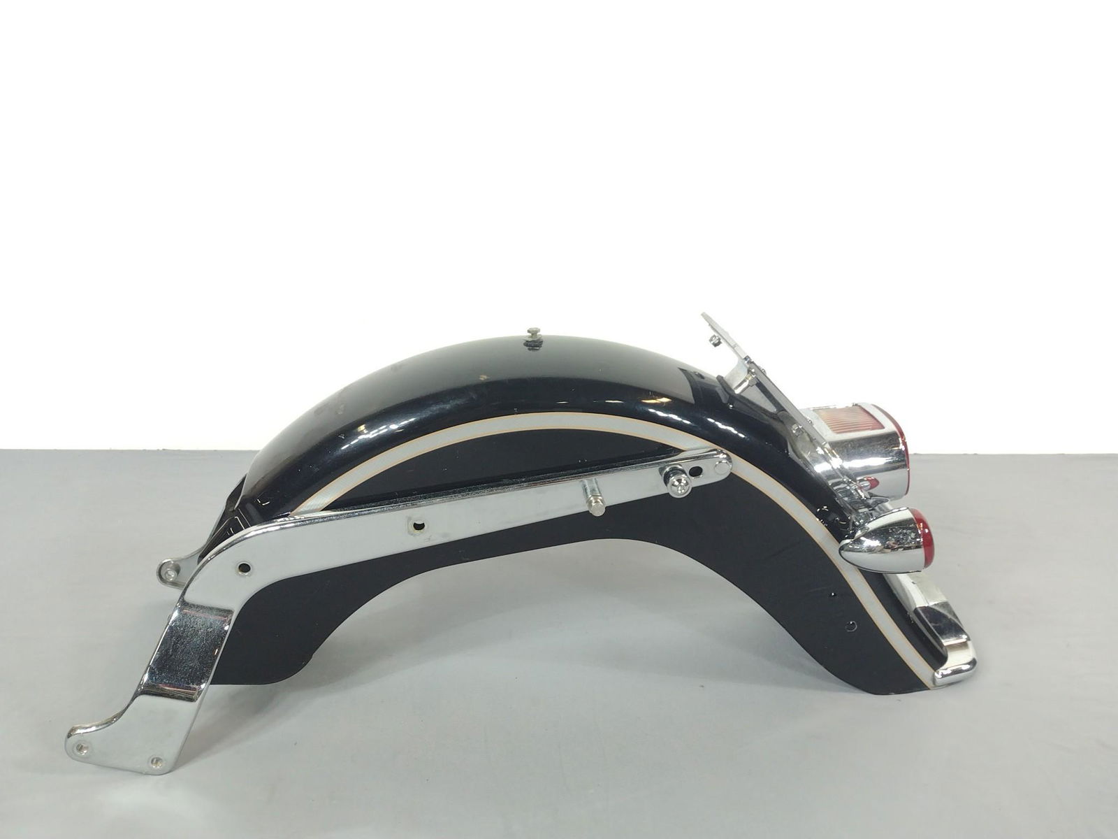 Harley Davidson Rear Fender With Brackets & Light Assembly: With brackets 13-1/4" wide X 34-1/2" deep X 14" high. Has some scratches and paint loss. MG. IMPORTANT: Before bidding, please read the terms and conditions. When you registered for the auction you ag