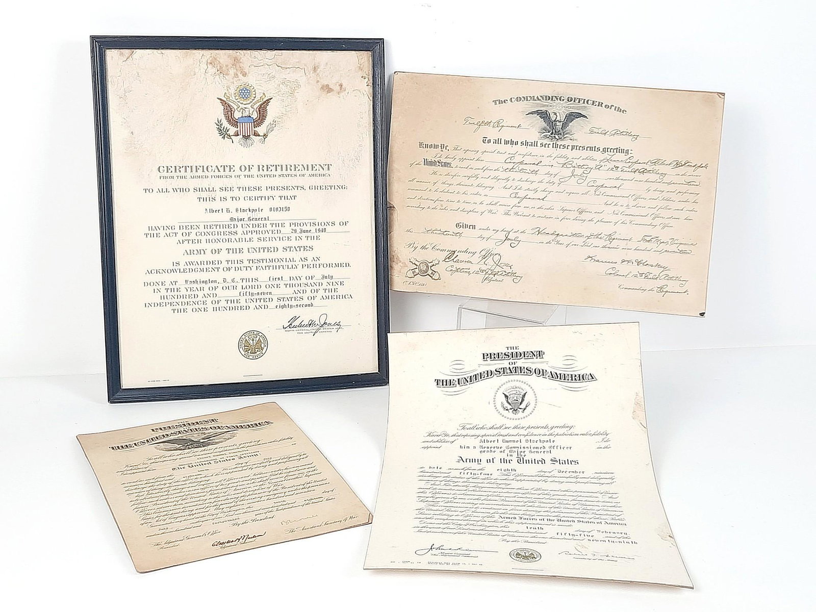 4 Albert H. Stackpole Military Appt. and Certificates: Includes 1957 Certificate of Retirement, 1917 corporal discharge, 1918 second lieutenant of field artillery discharge, and 1954 military appointment. Appointment paper with separation from cardboard b