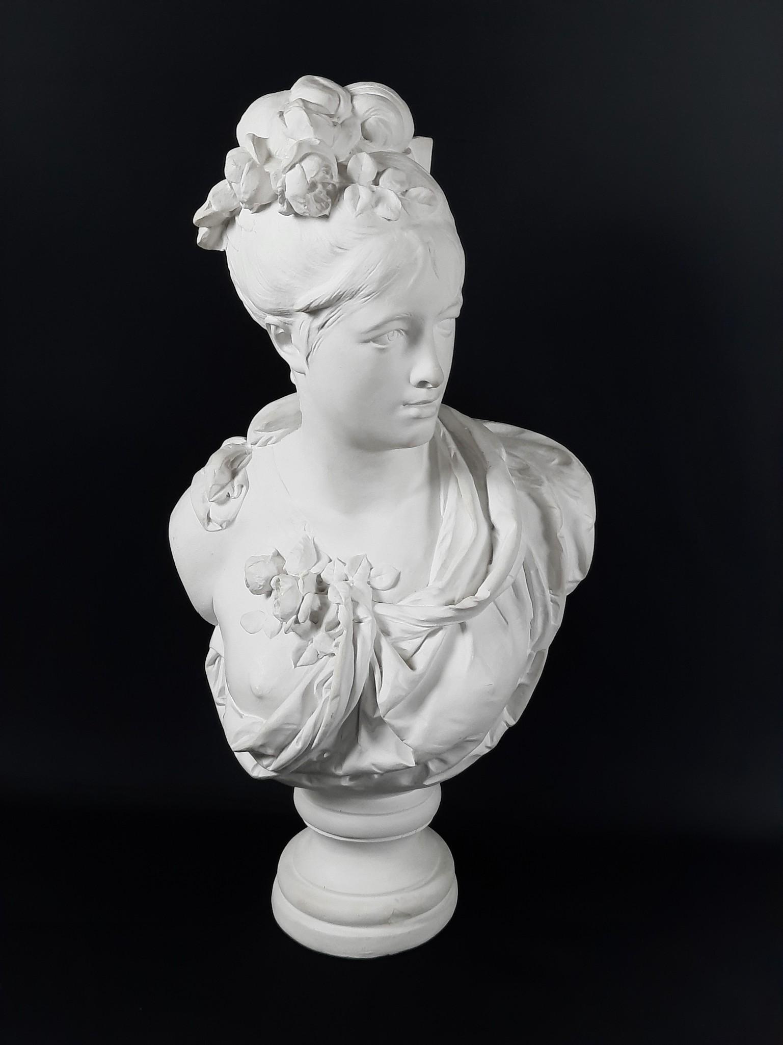 Aft. Albert Ernest Carrier-Belleuse "Bust of a Young Lady Sculpture: Made of plaster. 15" wide x 9" deep x 29" high. LR IMPORTANT: Before bidding, please read the terms and conditions. When you registered for the auction you agreed to these terms and will be required t