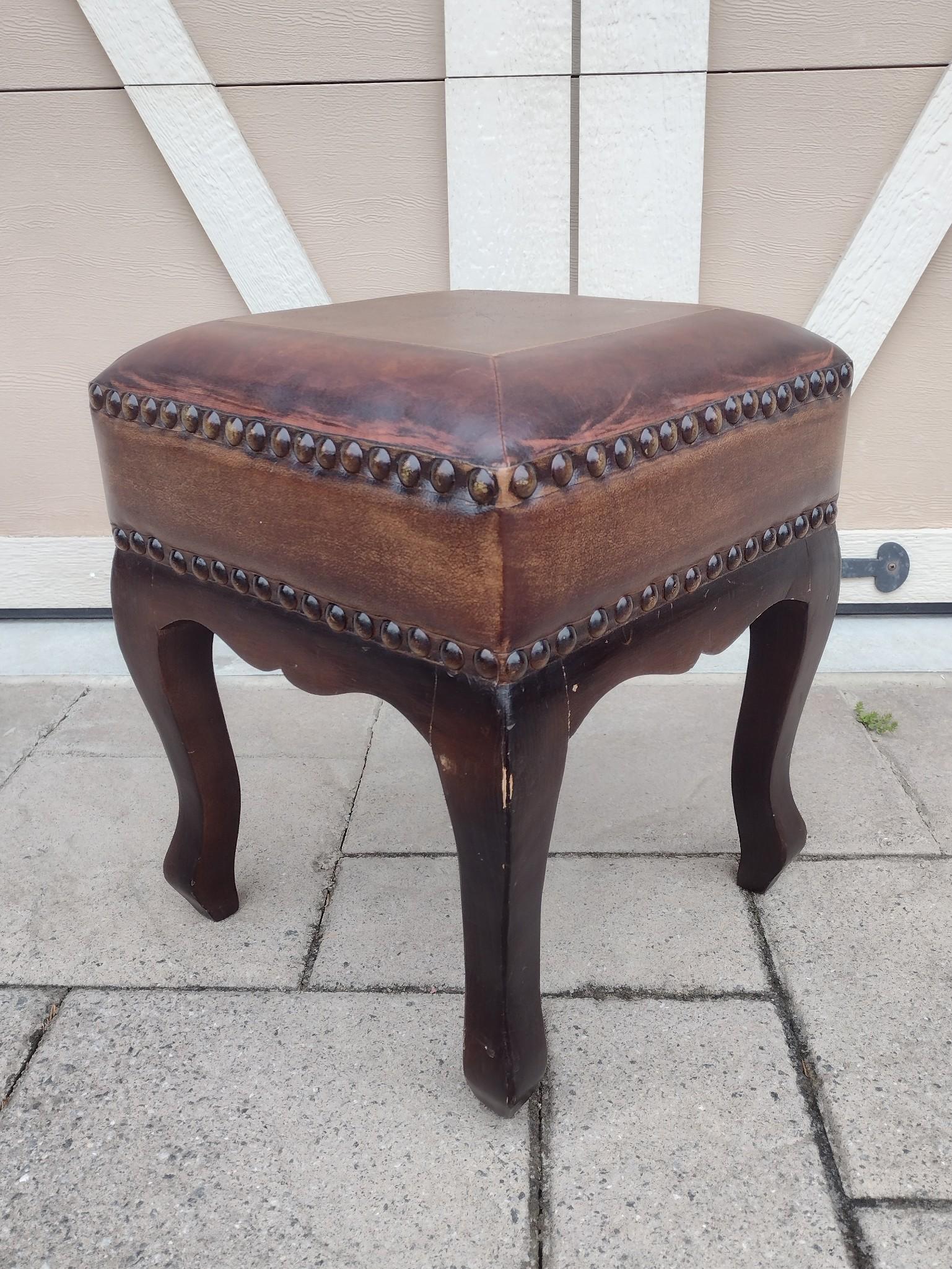 Leather Top Ottoman: 14" wide X 14" deep X 17" high. No manufactures name found. MG. IMPORTANT: Before bidding, please read the terms and conditions. When you registered for the auction you agreed to these terms and will 
