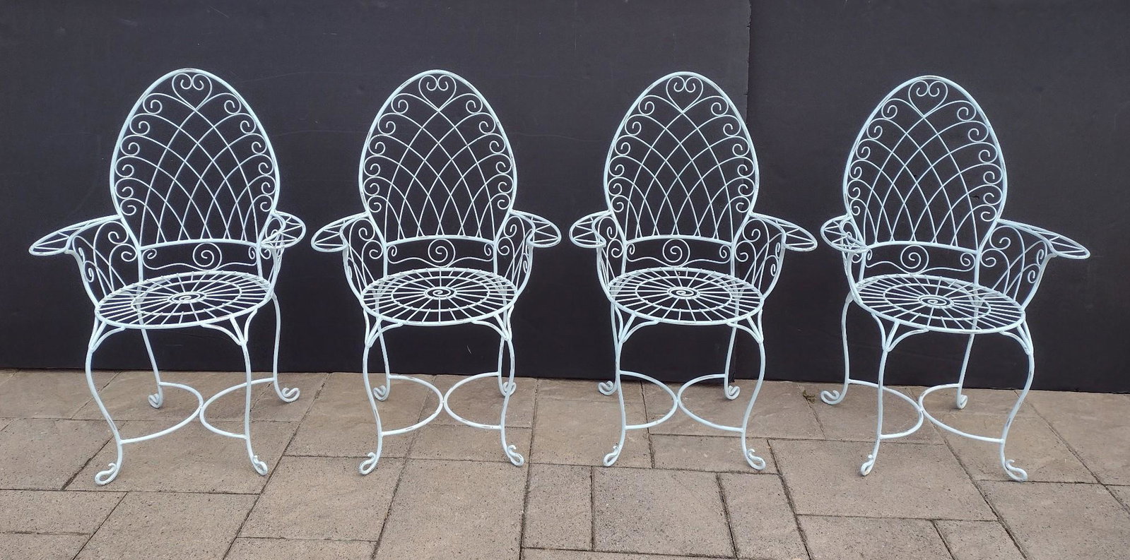 Four Metal Wire Chairs with Heart: 24-3/4" wide X 20" deep X 38" high. MG. IMPORTANT: Before bidding, please read the terms and conditions. When you registered for the auction you agreed to these terms and will be required to comply wi