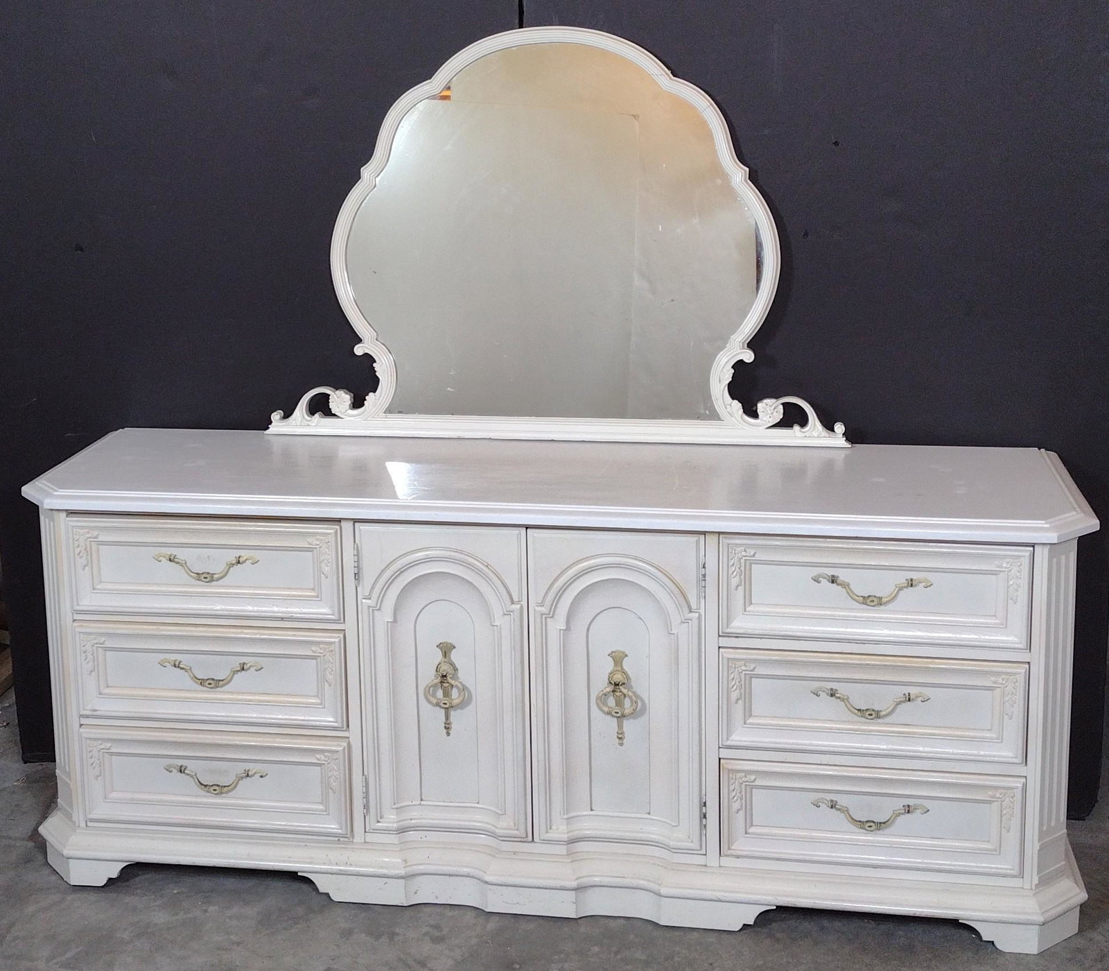 White Painted Stanley Dresser With Mirror: 80-1/2" wide X 22" deep X 66-1/2" high. Has some scratches and areas of discoloring. Has hole in back panel. MG. IMPORTANT: Before bidding, please read the terms and conditions. When you registered fo