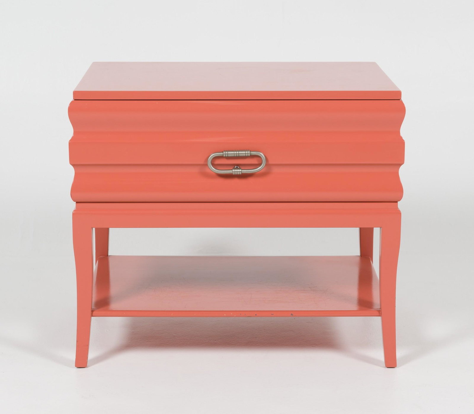 Parzinger Peach Nightstand: DESCRIPTION: Parzinger peach nightstand with single drawer. Additional shelf below drawer. Unmarked. PROVENANCE: From the Estate of Lois Lehrman Grass Harrisburg, PA. MEASUREMENTS: 24" wide x 18" deep