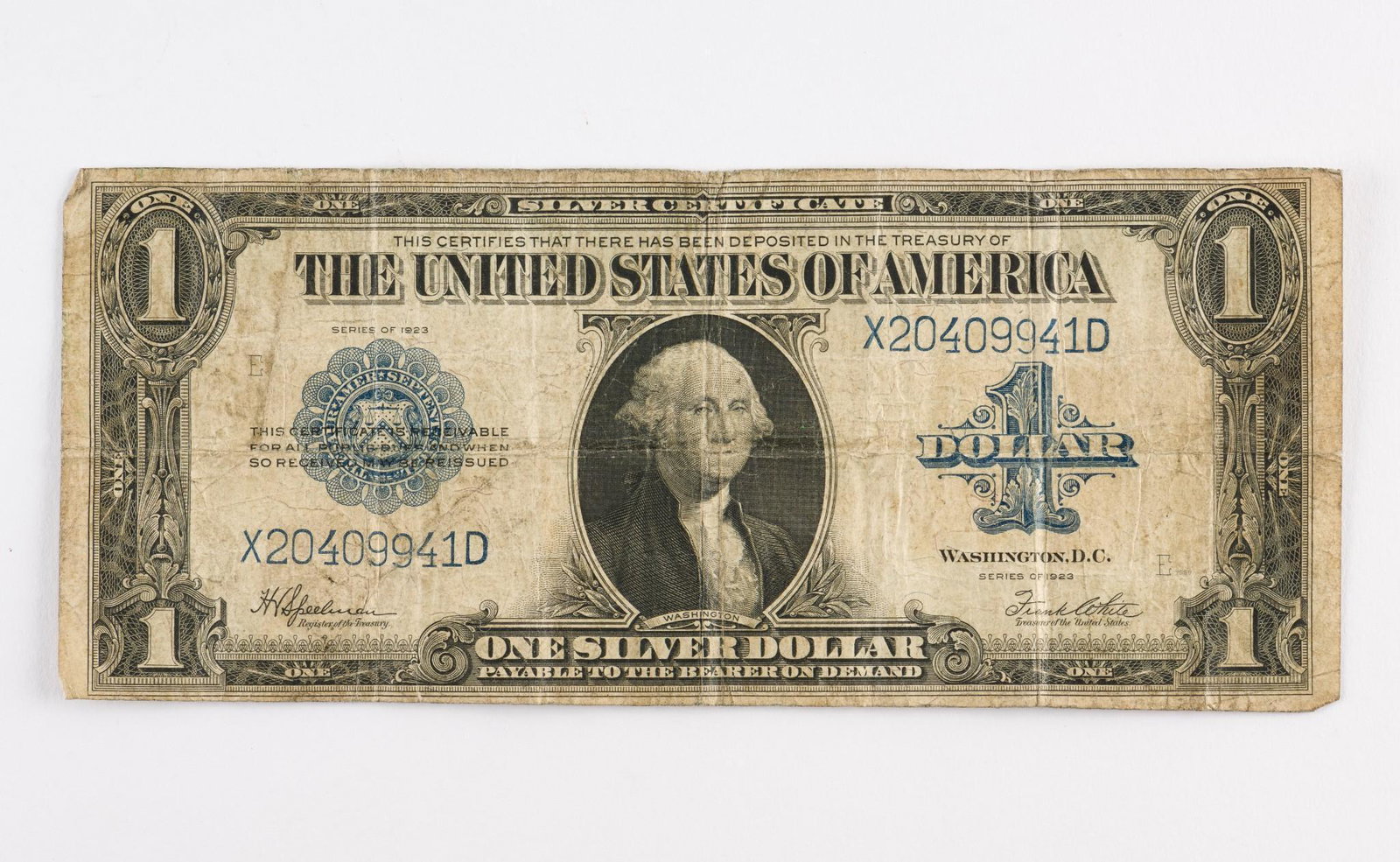 1923 $1.00 Silver Certificate: Good with folds. AJ. IMPORTANT: Before bidding, please read the terms and conditions. When you registered for the auction you agreed to these terms and will be required to comply with them.