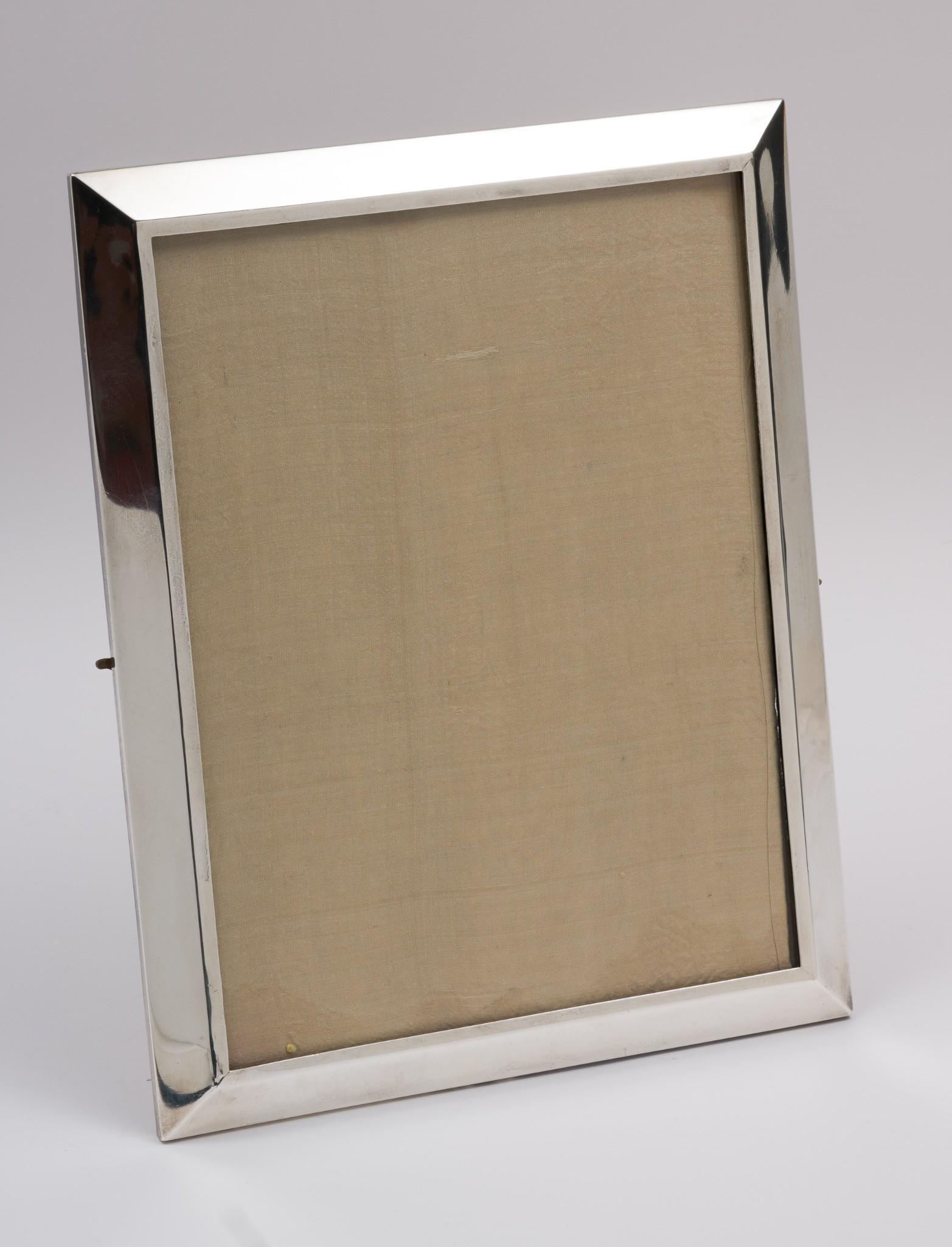Kerr Sterling Frame: Marked sterling and for Kerr. 8-1/4" wide x 10-3/4" high. Light scratching and wear as expected with careful use. AJ. IMPORTANT: Before bidding, please read the terms and conditions. When you register