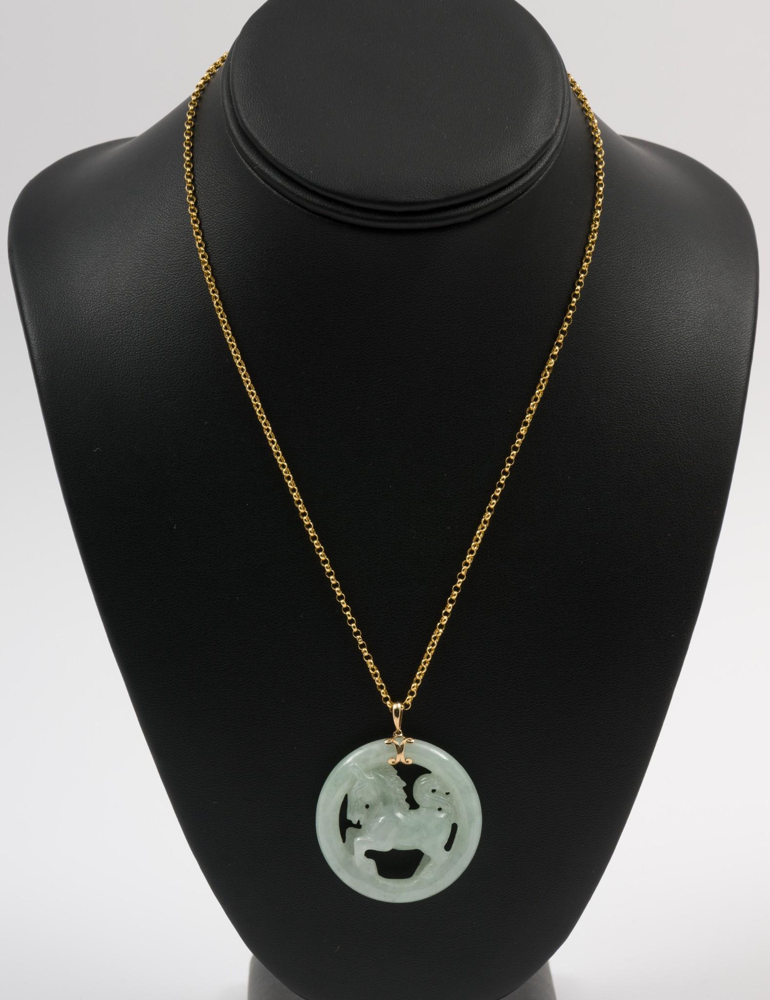 14K Gold & Nephrite Horse Pendant Necklace: Marked 14k gold pendant with carved nephrite horse. Chain marked 585. Chain 16" long. Pendant 1-1/2" diameter. Chain only 1.7 dwt. AJ/EK IMPORTANT: Before bidding, please read the terms and conditions