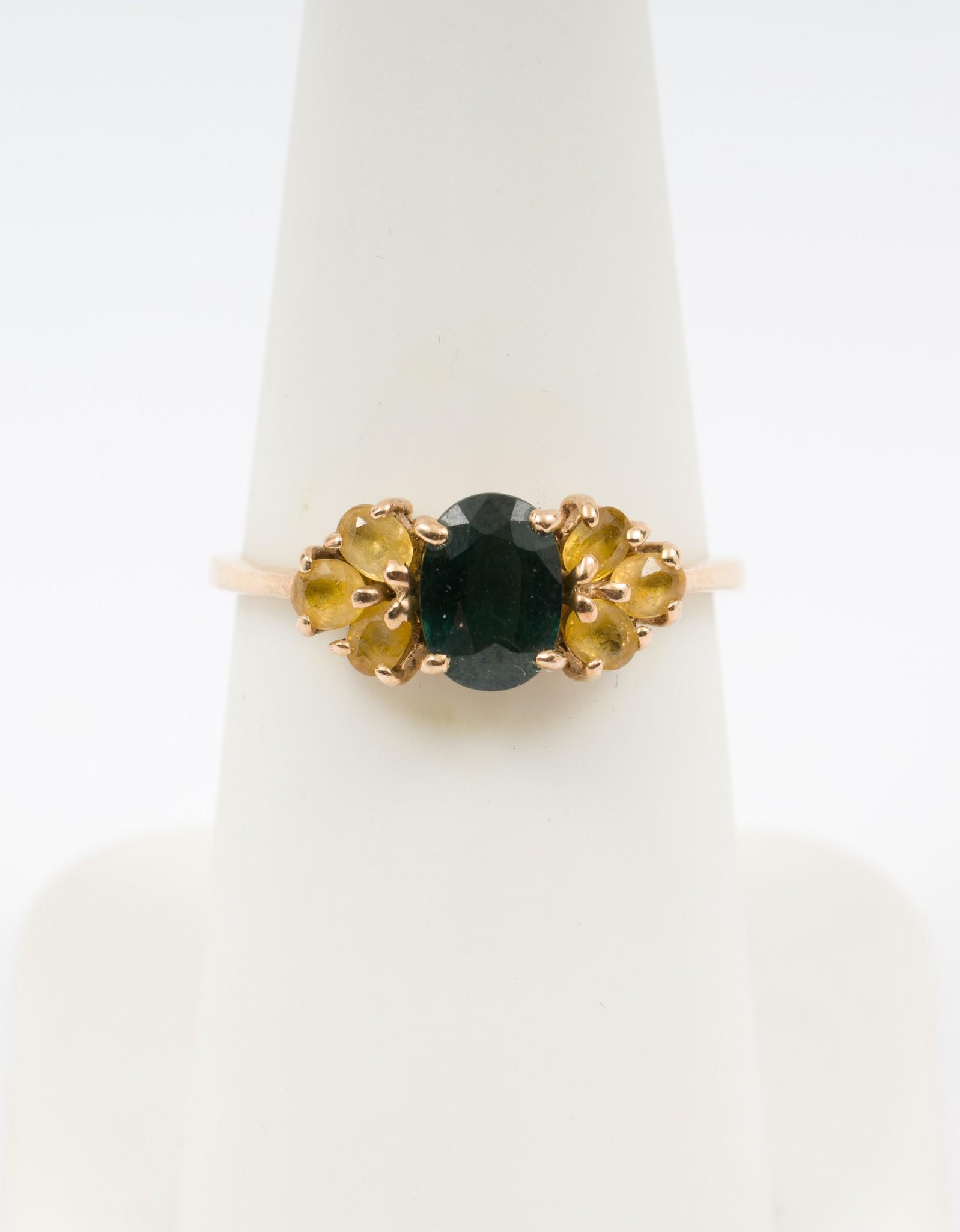 14K Gold & Sapphire Ring: Marked 14k gold ring with center oval cut .51 carat green sapphire and six approximately .15 carat each oval cut yellow sapphires. Size 7. Top 1/4" wide. 1.6 dwt. AJ/EK IMPORTANT: Before bidding, plea