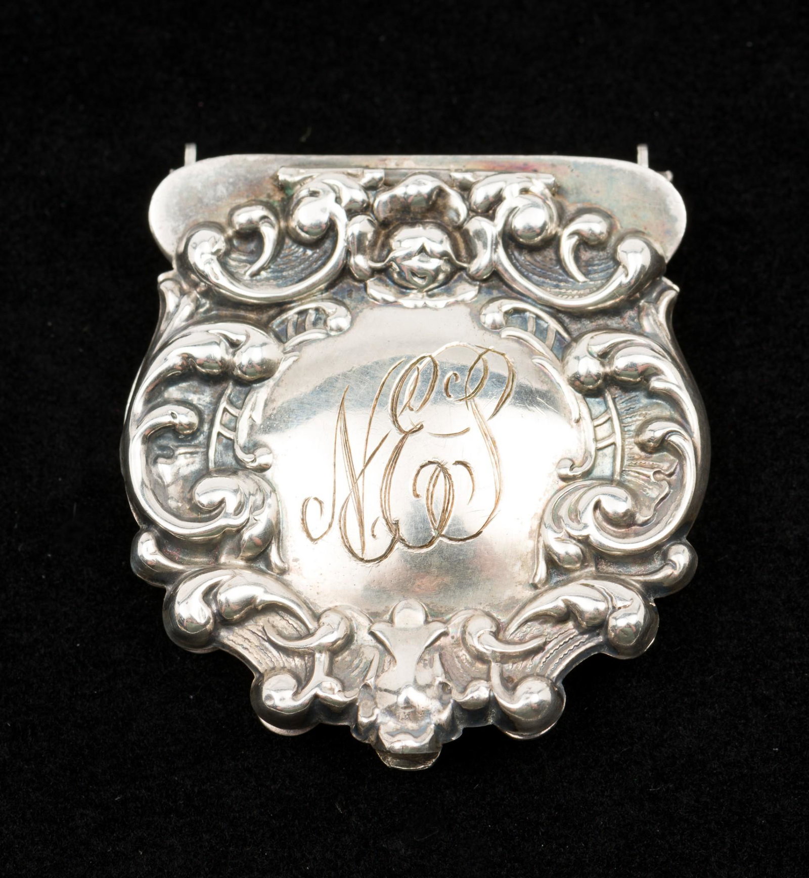 Sterling Buckle With Miniature Photograph: C. late 1800s. Monogrammed. Miniature portrait to interior. Marked sterling. 0.3 ozt. 1-3/8" high. AJ. IMPORTANT: Before bidding, please read the terms and conditions. When you registered for the auct