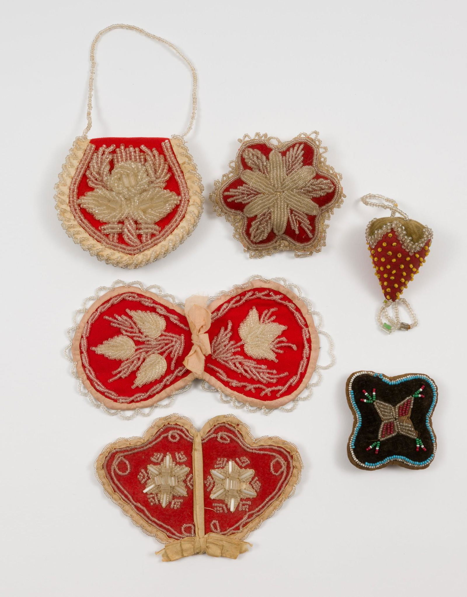 3 Beaded Pin Cushions & 3 Beaded Needle Cases: Includes red floral beaded pin cushion; brown pin cushion with red, green, white, and blue beads; strawberry beaded pin cushion, heart shaped beaded needle case, and two floral beaded needle cases. 1-