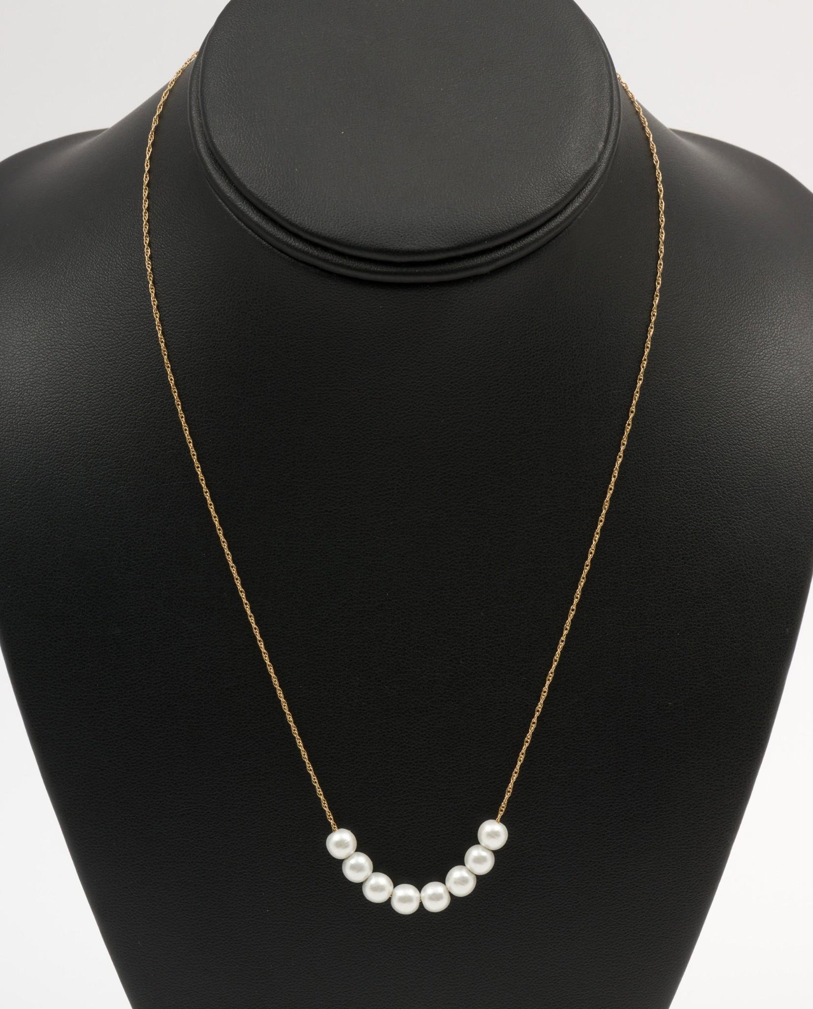 14K Gold and Pearl Necklace: Marked 14k gold chain with 8 pearls, each 6mm. Marked 14k. 1.3 dwt. 18-1/2" long. MEG/EK IMPORTANT: Before bidding, please read the terms and conditions. When you registered for the auction you agreed