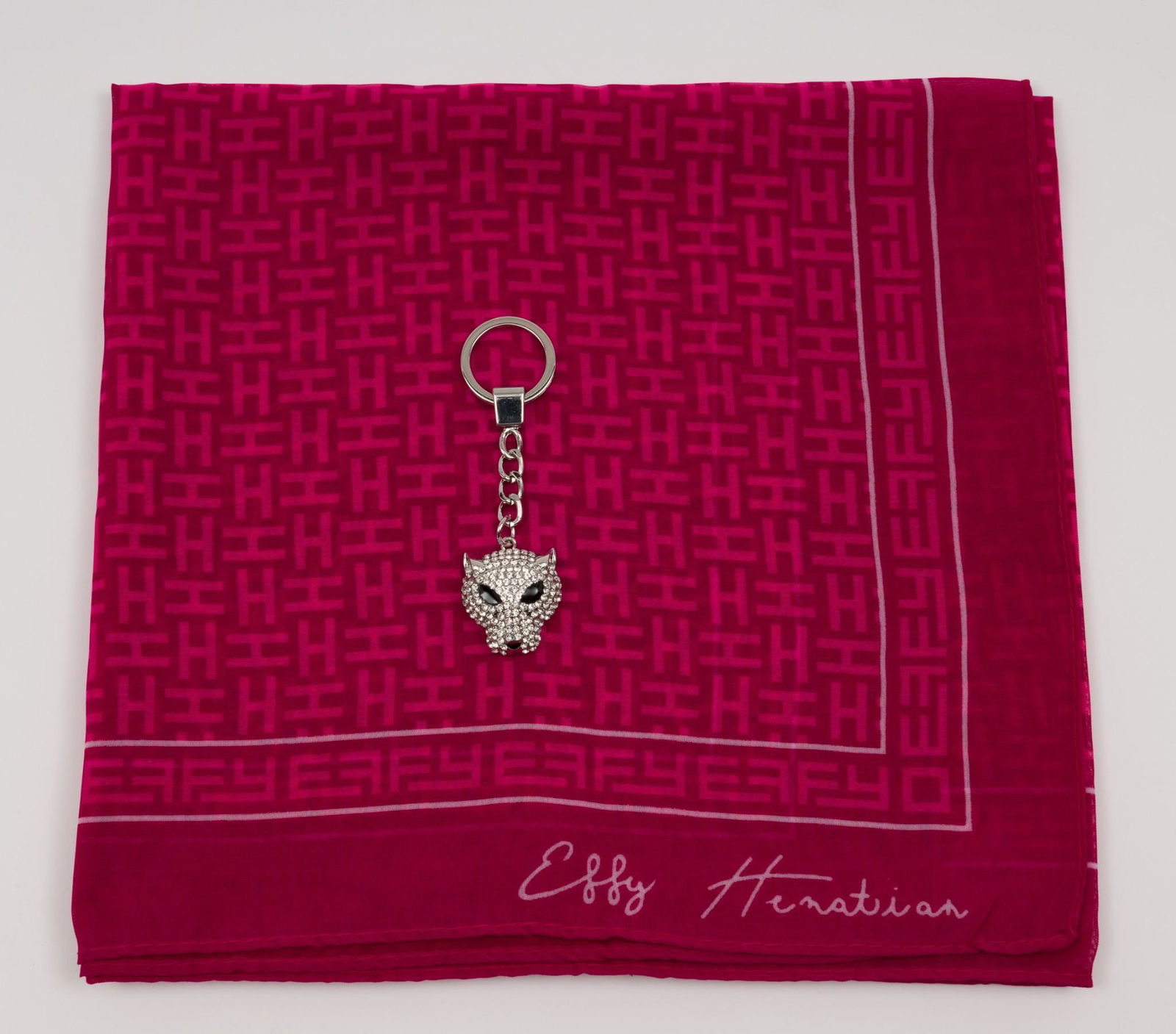 Effy Hematian Scarf with Keychain: Pink Effy Hematian scarf with jaguar rhinestone keychain. Packaging 10-1/4" wide x 9-1/2" long. Signed lower right hand corner of scarf. MEG IMPORTANT: Before bidding, please read the terms and condit