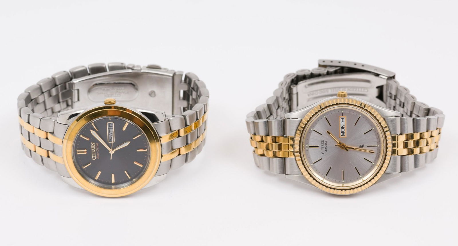2 Citizen Wristwatches: Includes Citizen Eco Drive and Citizen Quartz. Eco Drive serial number 880074. Quartz serial number 3056535. 2-1/4" to 2-1/2" diameter x 1-1/2" wide. Both running. MEG IMPORTANT: Before bidding, pleas