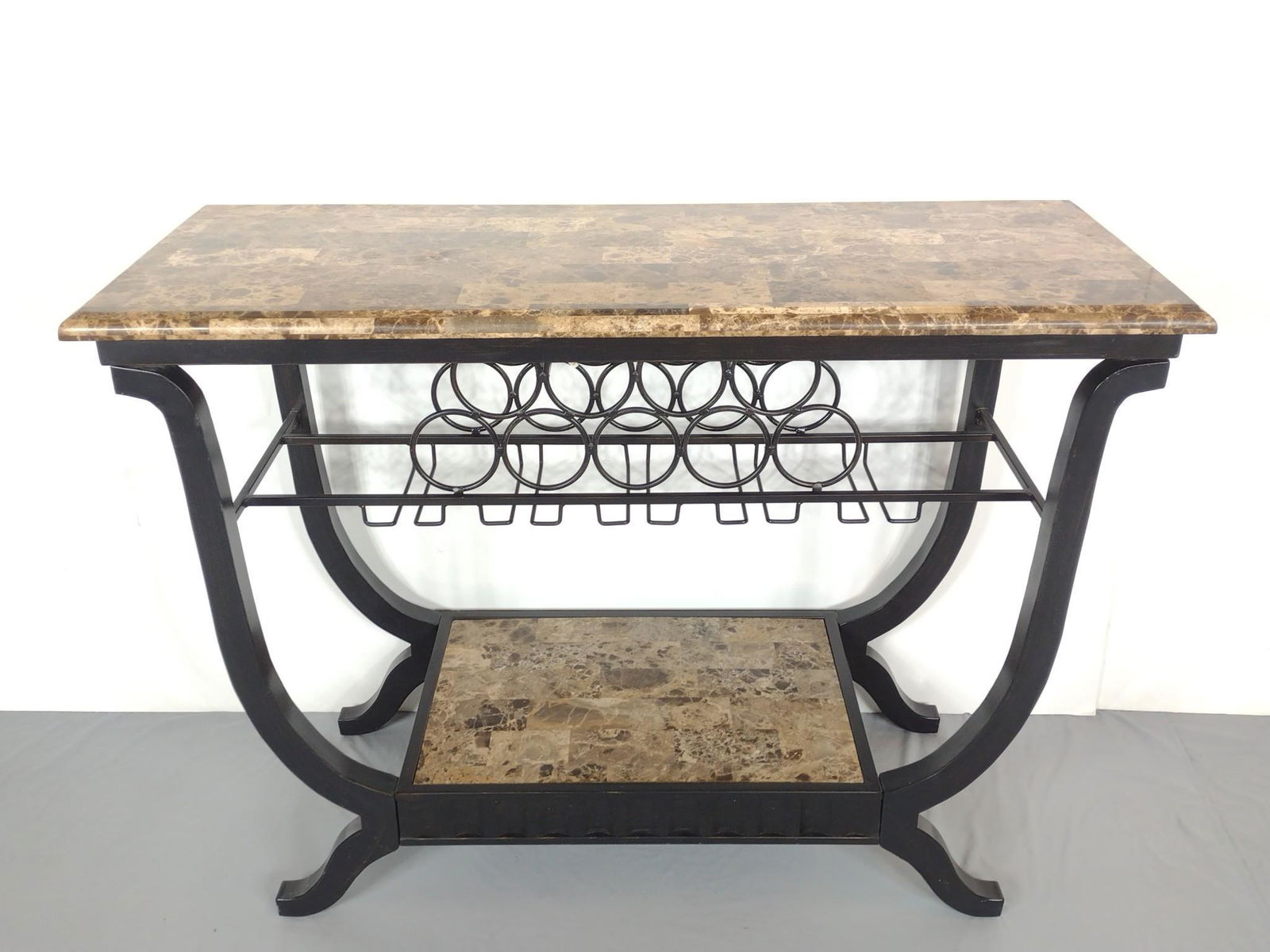 Marble Top Console Table With Wine Rack: 50" wide X 19" deep X 36-1/2" high. No manufactures name found. MG. IMPORTANT: Before bidding, please read the terms and conditions. When you registered for the auction you agreed to these terms and w
