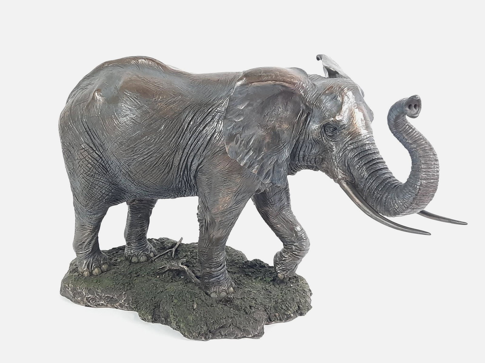 Elephant Figurine: Made of resin. 18" wide x 12" deep x 12" high. Both tusks repaired. LR From the estate of Robert Harman. IMPORTANT: Before bidding, please read the terms and conditions. When you registered for the au