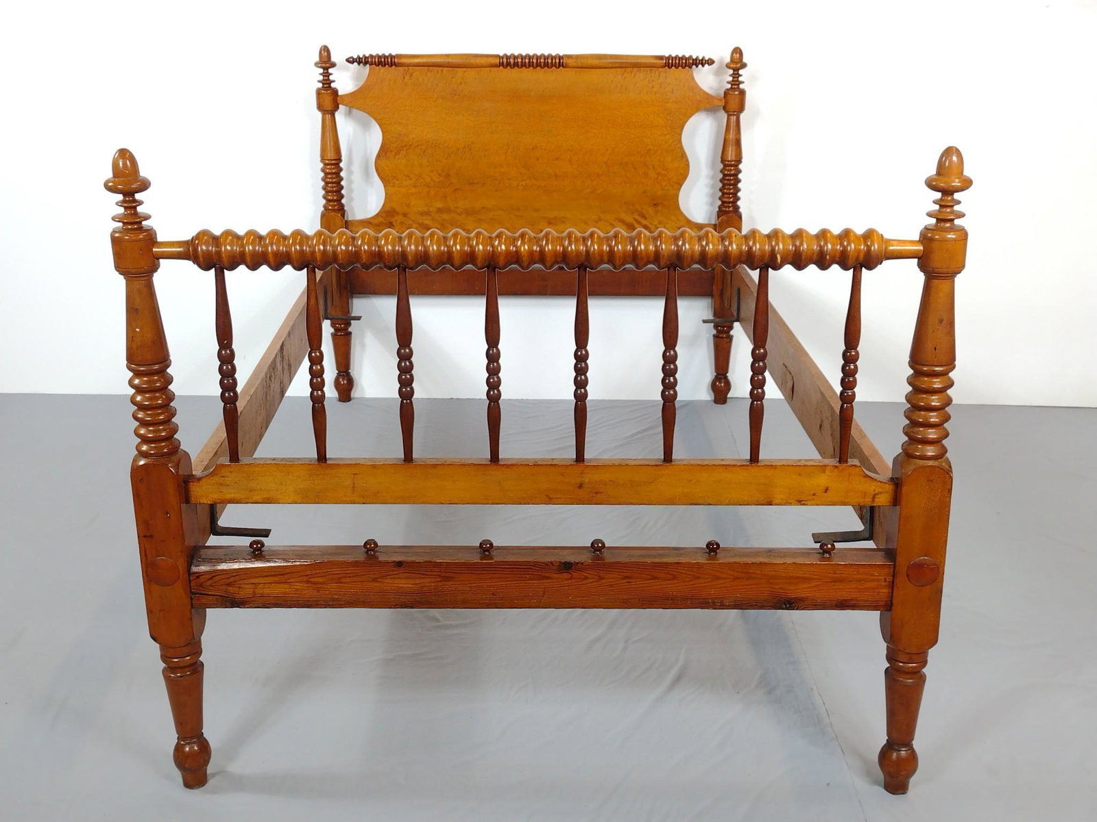 19th c Maple Spindle Bed: 50" wide X 79" deep X 43" high. Has scratches. MG. IMPORTANT: Before bidding, please read the terms and conditions. When you registered for the auction you agreed to these terms and will be required t
