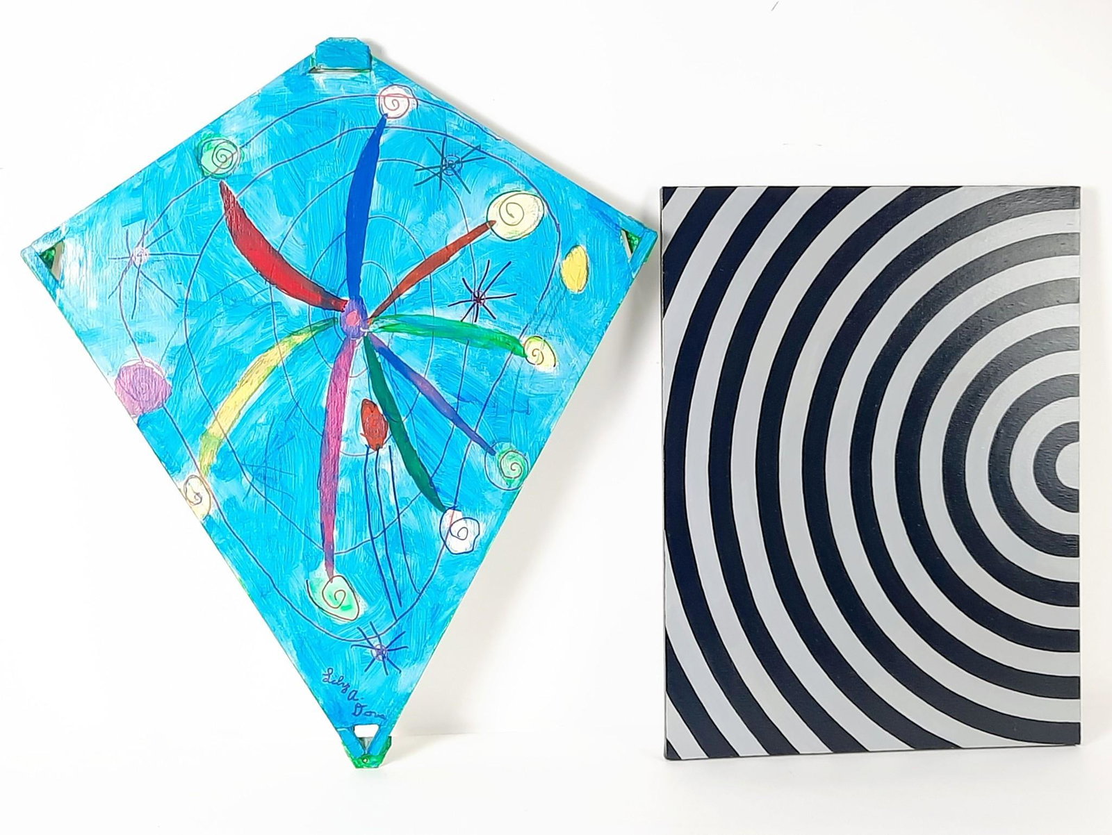 2 Paintings incl Double Sided Kite Signed Lily A. Dove: Kite believed to be from The Whitaker Center Kite Festival in 2006. Black and grey painting unsigned. Overall with frames 24" to 29-3/4" high x 18" to 25-1/2" wide. LR IMPORTANT: Before bidding, pleas