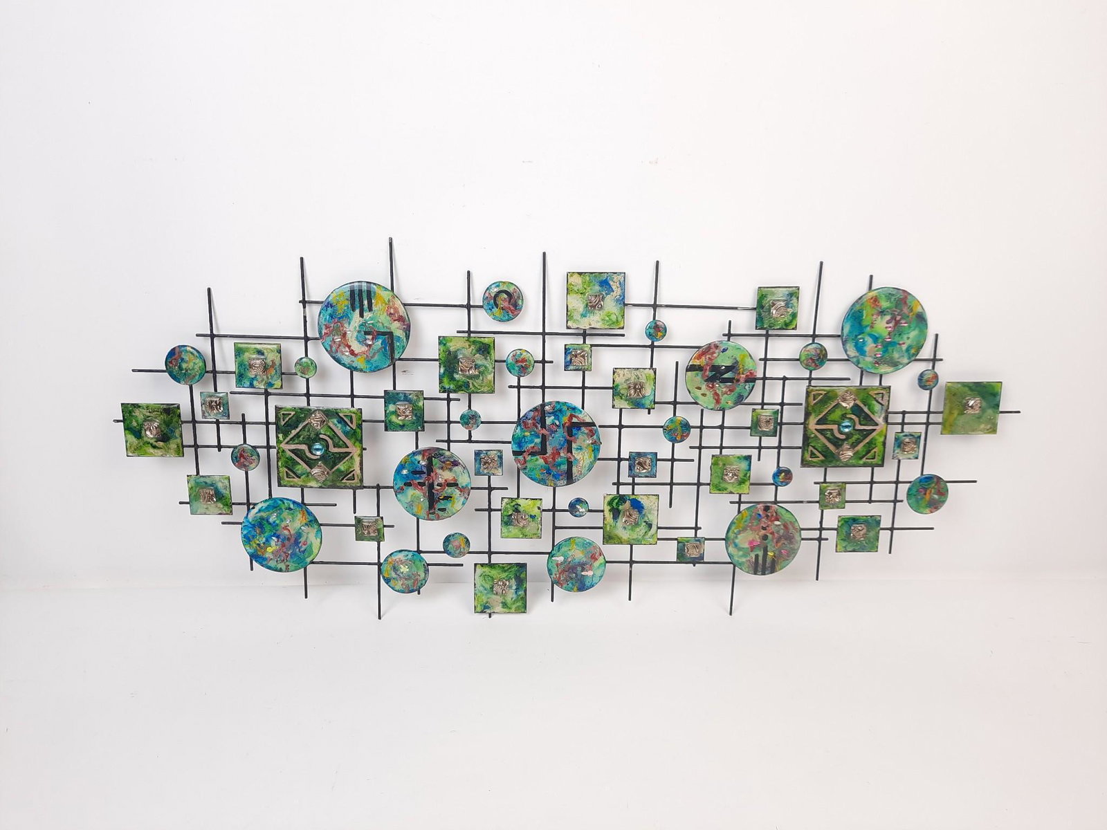 Mid Century Enamled Sculpture with Glass Embellishments: Signature on verso indecipherable. 14" high x 32-1/4" wide. LR IMPORTANT: Before bidding, please read the terms and conditions. When you registered for the auction you agreed to these terms and will b